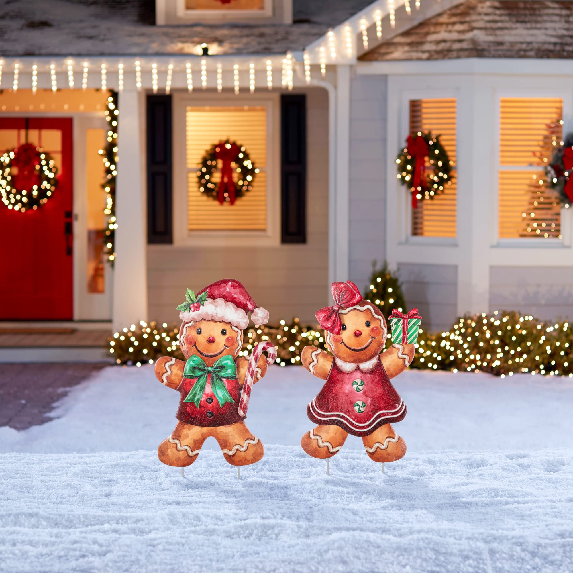 Glitzhome® Set of 2 Christmas Metal Gingerbread Boy and Girl Yard Stake