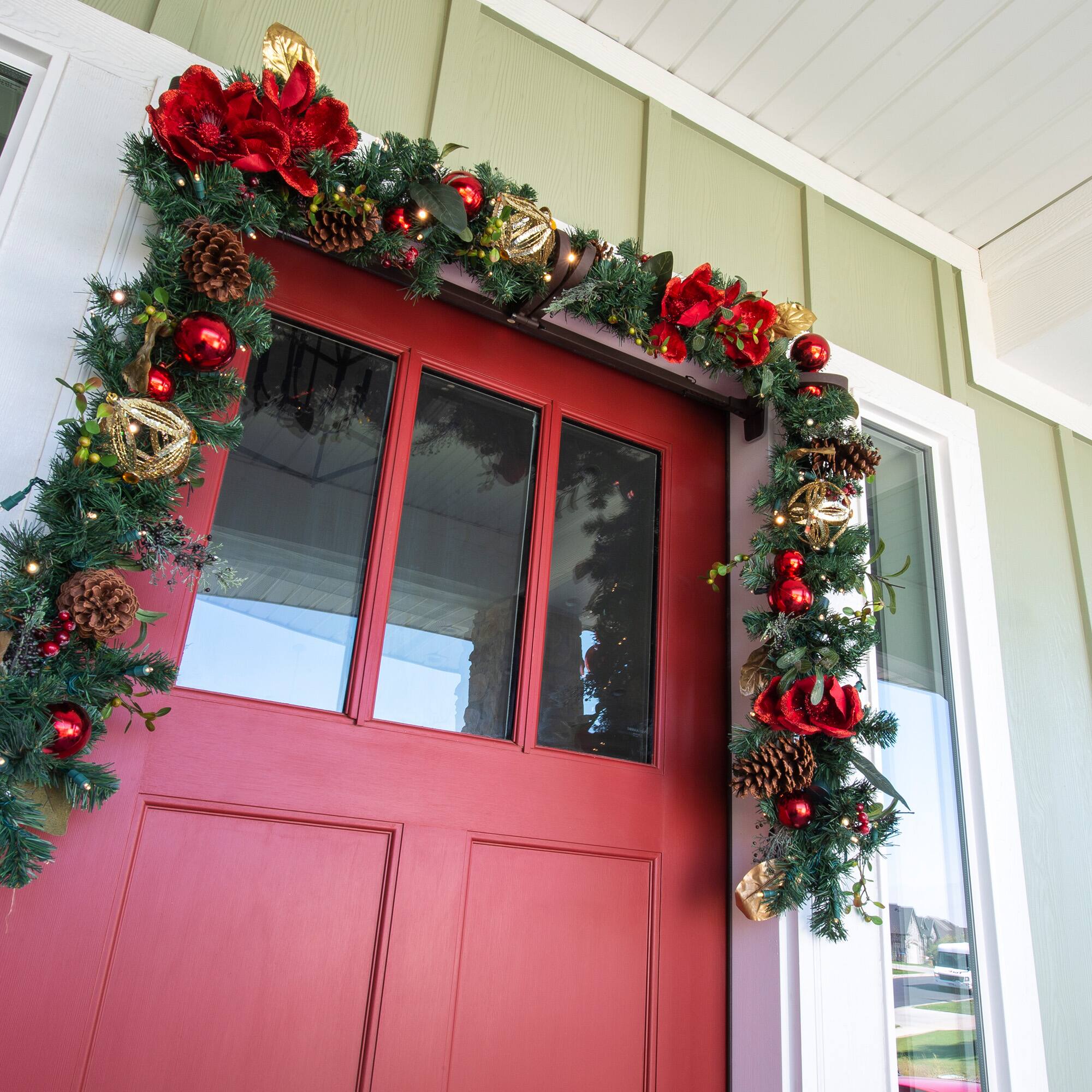 Village Lighting 9ft. Pre-Lit LED Red Magnolia Christmas Garland