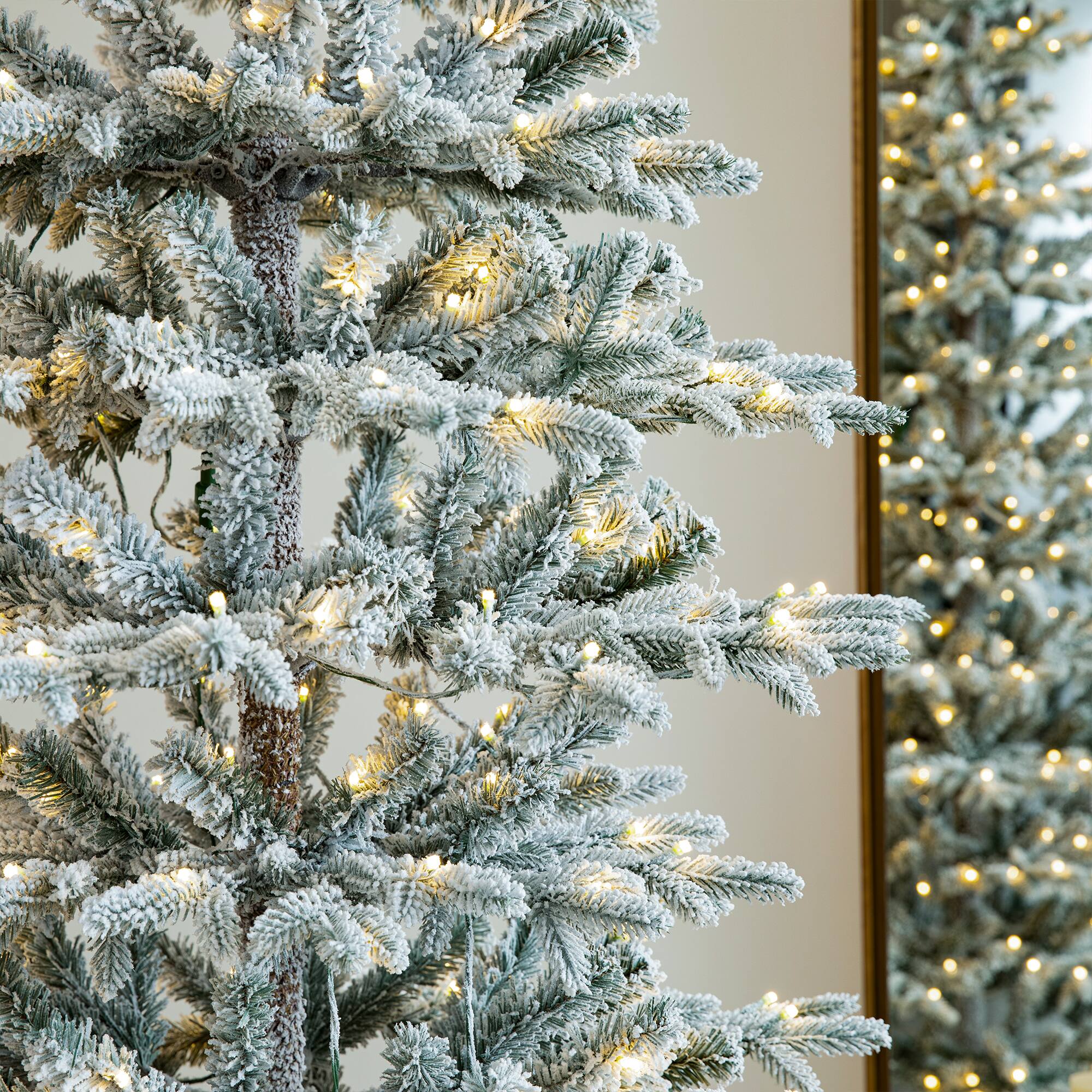 8ft. Pre-Lit Deluxe Flocked Slim Fir Artificial Christmas Tree, Warm White LED Lights