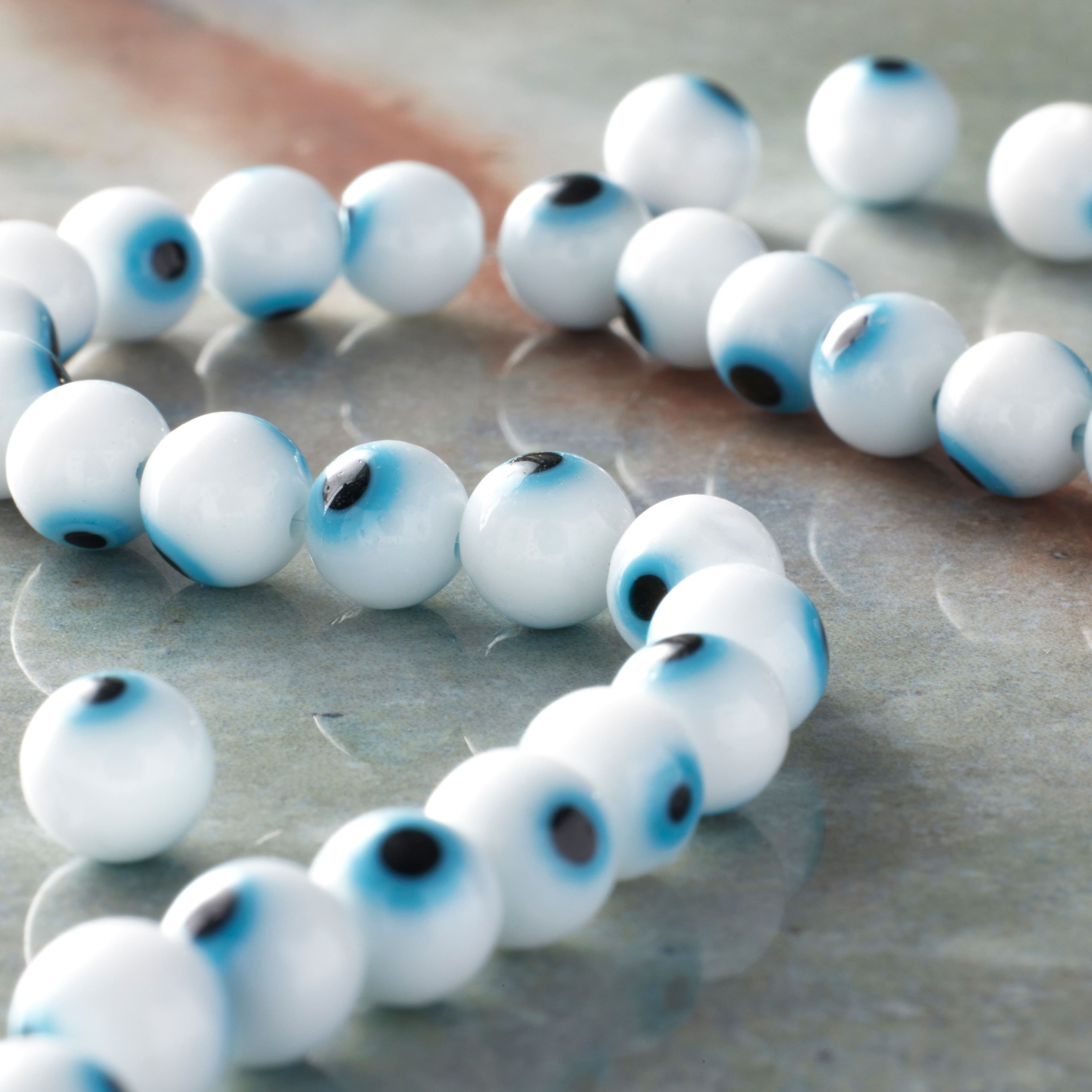 12 Pack: White Evil Eye Glass Round Beads, 6mm by Bead Landing™
