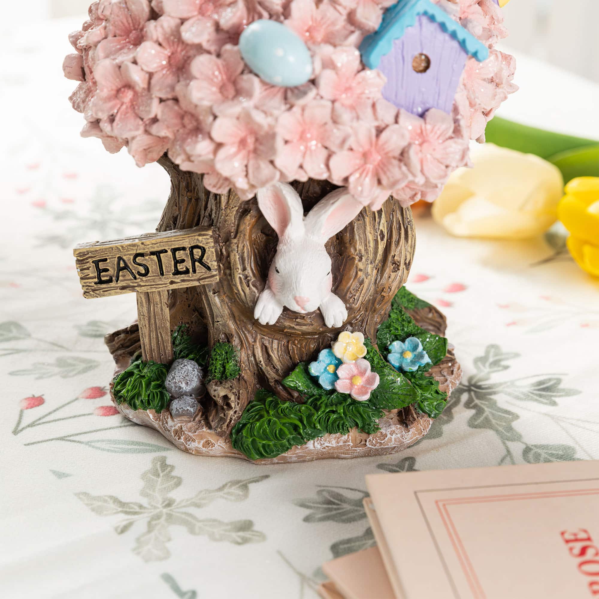 Glitzhome® 8" Easter Resin Bunny & Pink Blossoms Table Decor