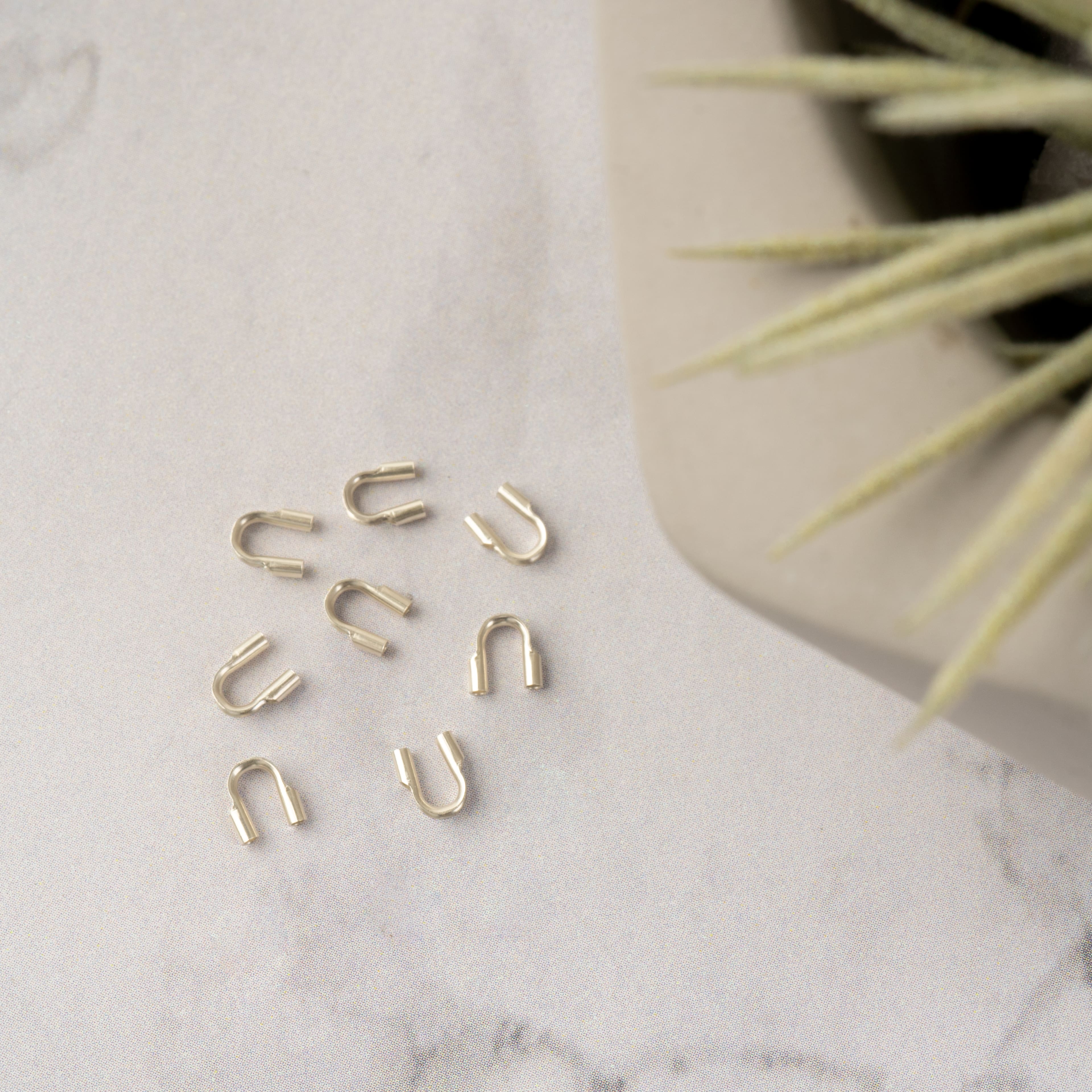 6 Packs: 8 ct. (48 total) 0.031'' Sterling Silver Wire Guards by Bead Landing™