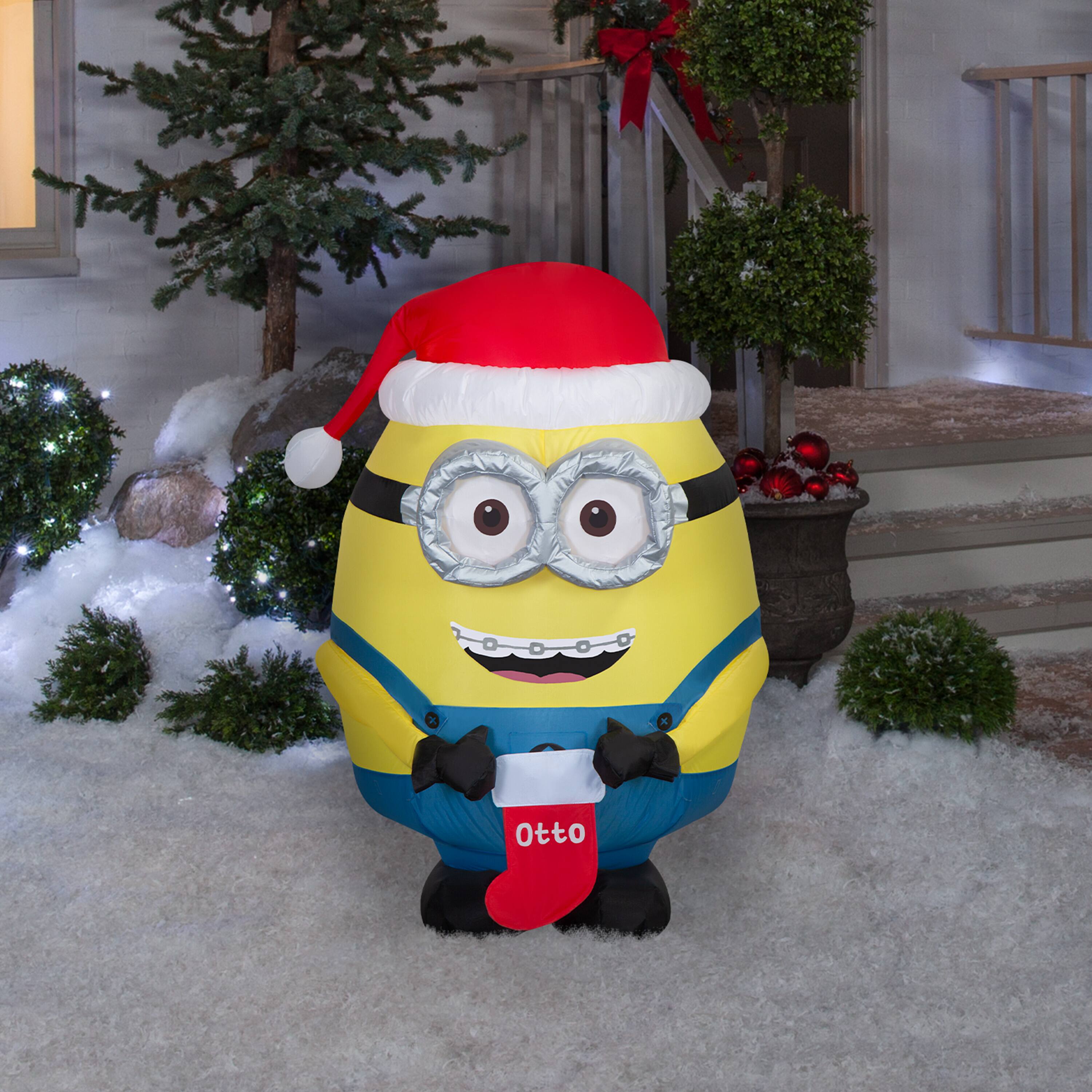 3ft. Airblown® Universal Inflatable Minion Otto with Stocking Christmas Light Décor