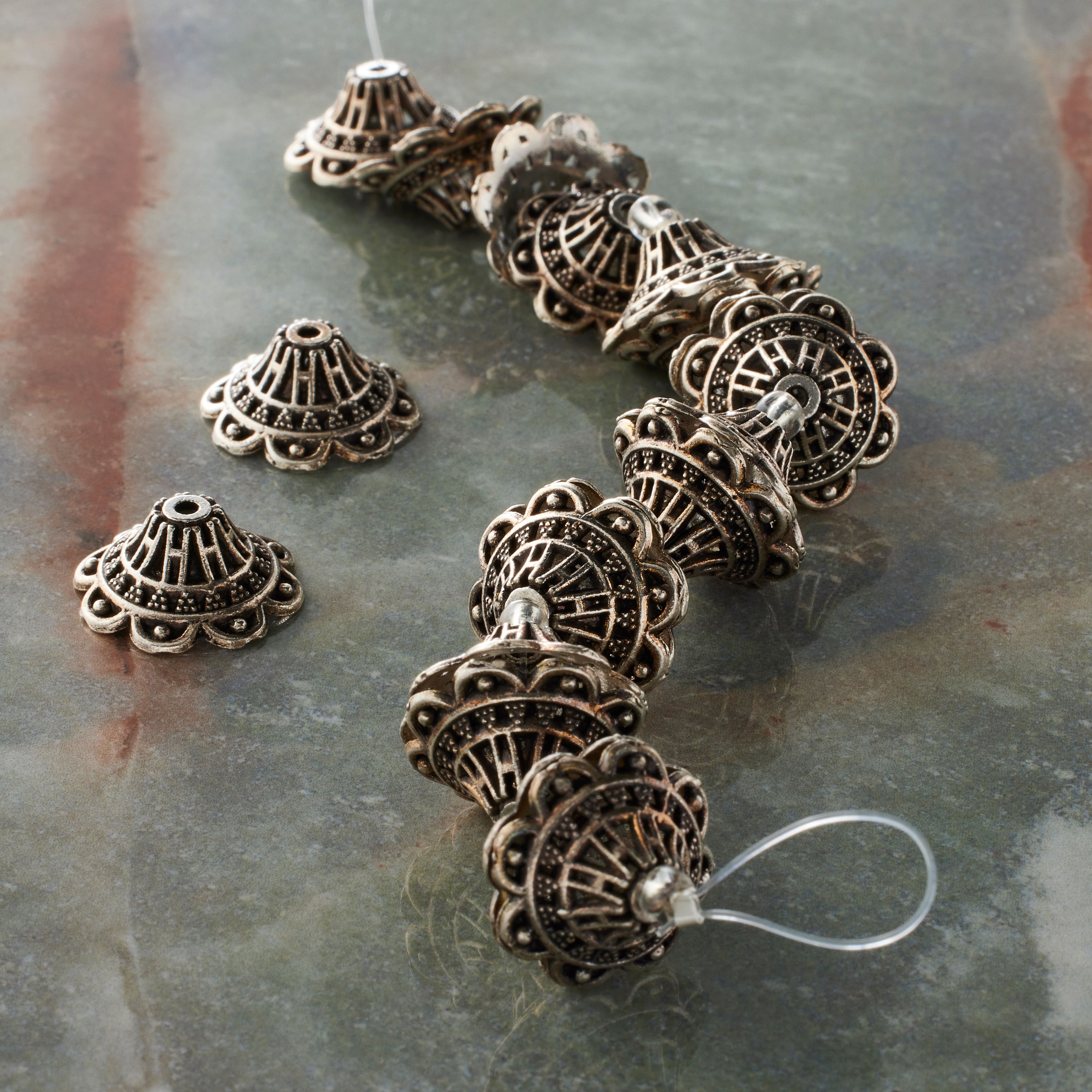 12 Packs: 18 ct. (216 total)  Silver Metal Cap-shaped Beads, 18mm by Bead Landing™