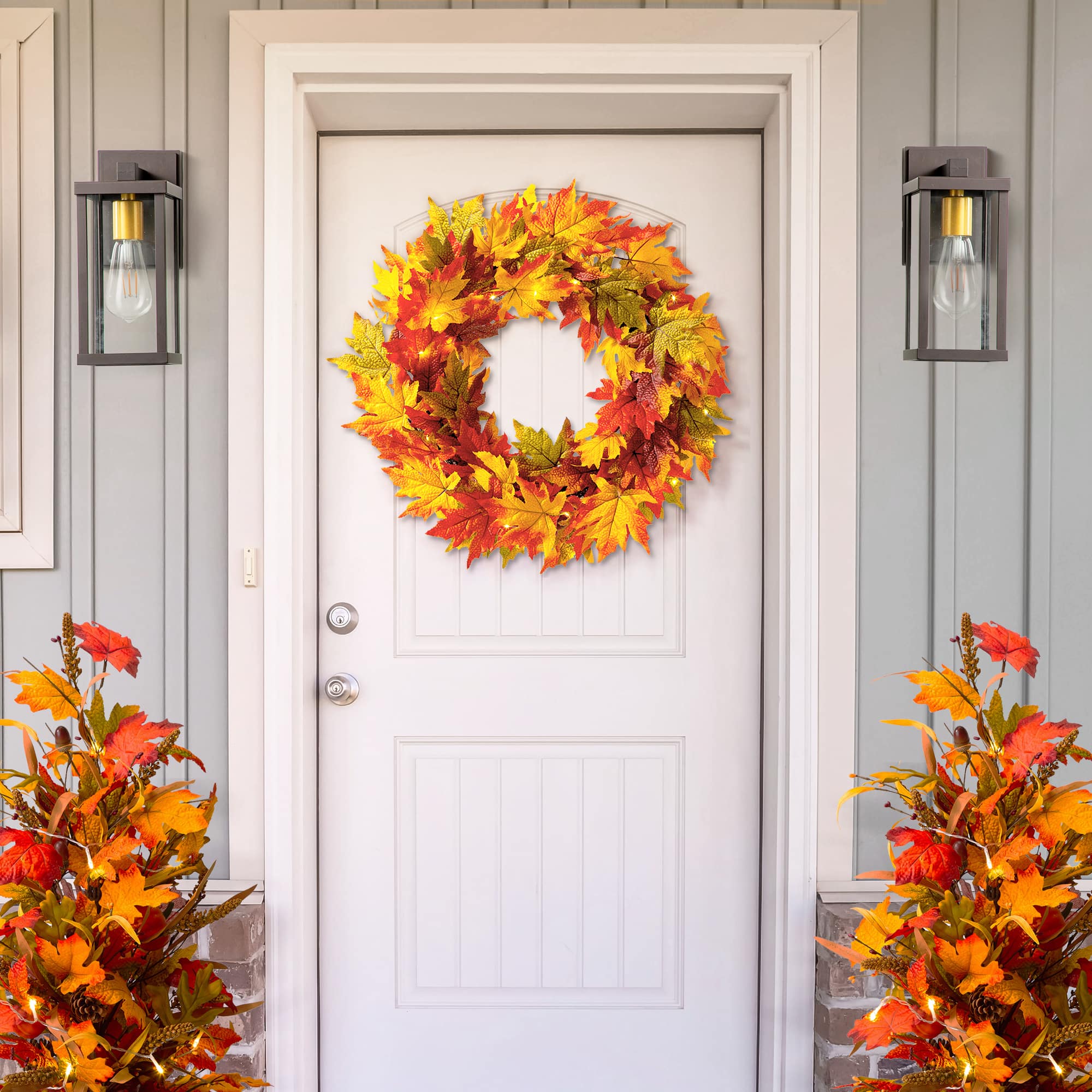Glitzhome® 24" Fall Lighted Maple Leaves Wreath with Timer