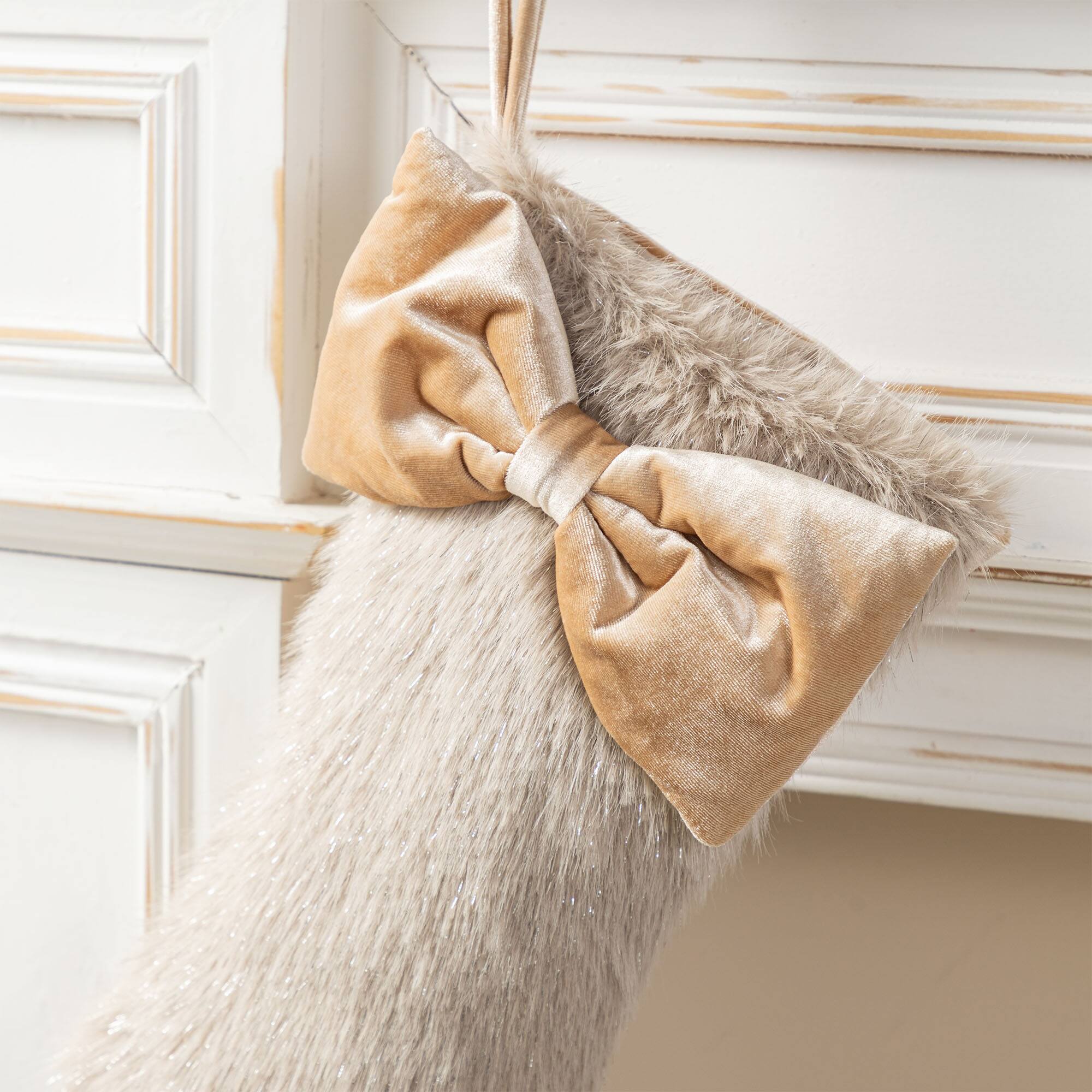 Glitzhome® 21"L Faux Fox Fur Christmas Stocking with Bow