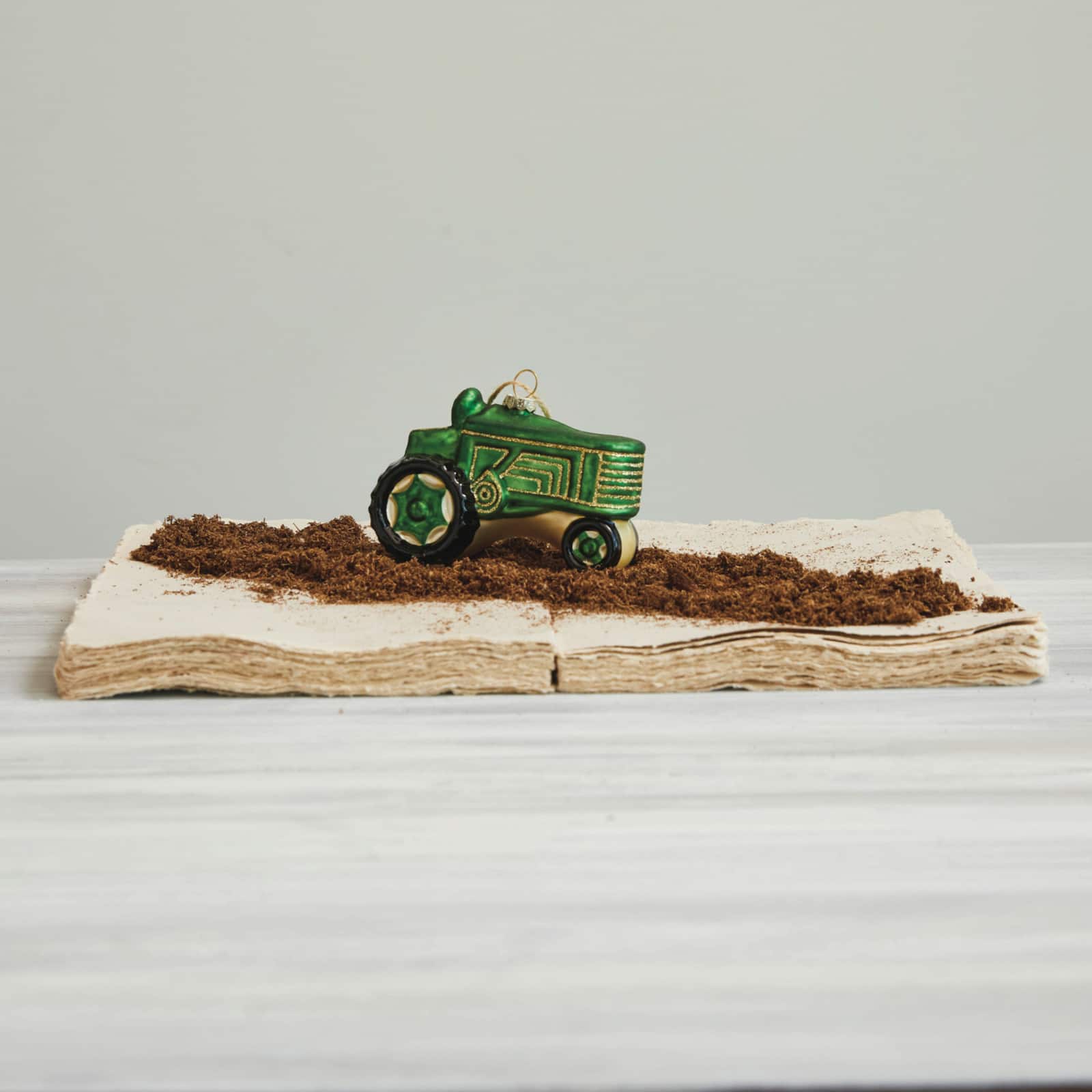 Hello Honey® 4.5" Green Hand-Painted Glass Tractor Ornament with Glitter