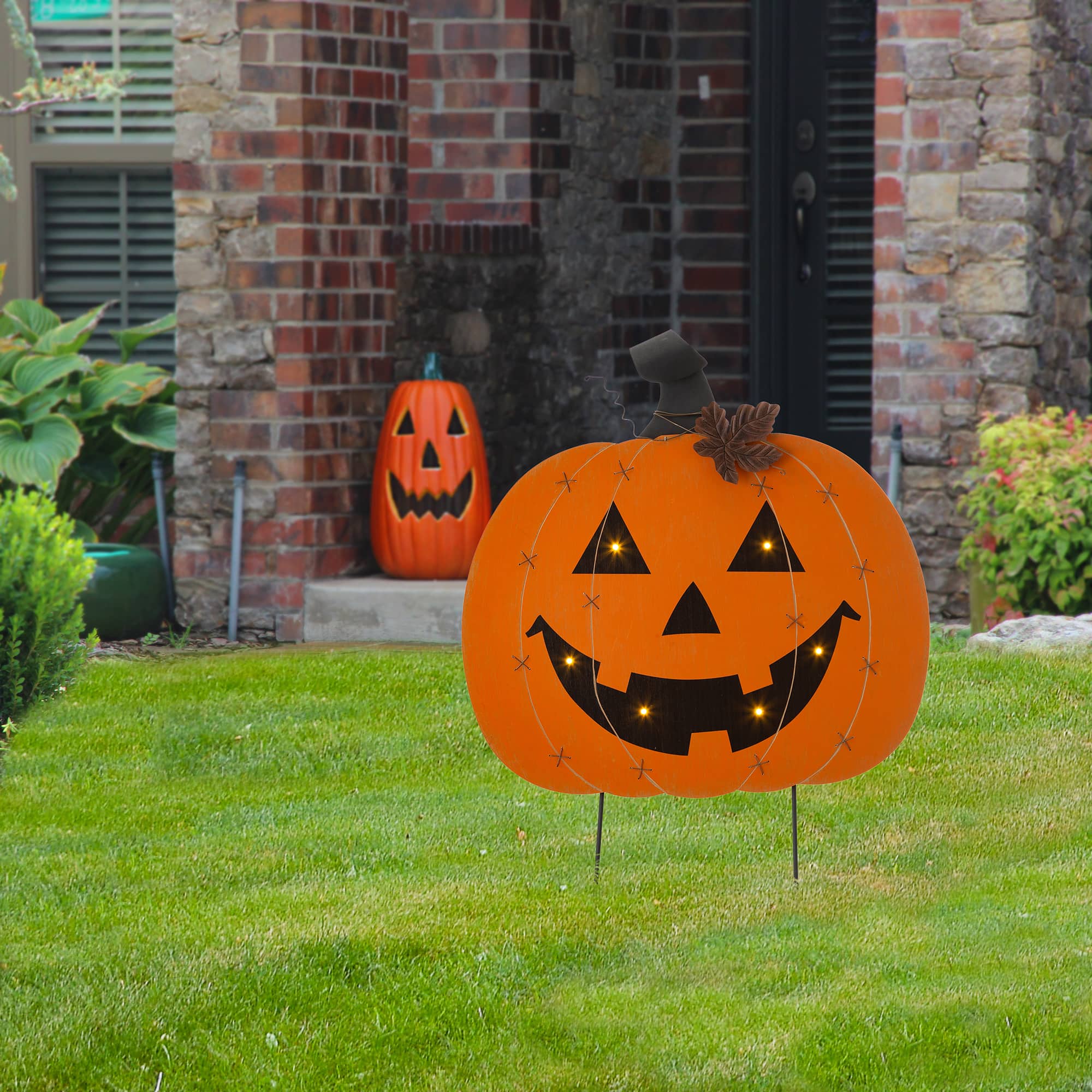 Glitzhome® 30" Orange Lighted Metal Halloween Pumpkin Yard Stake