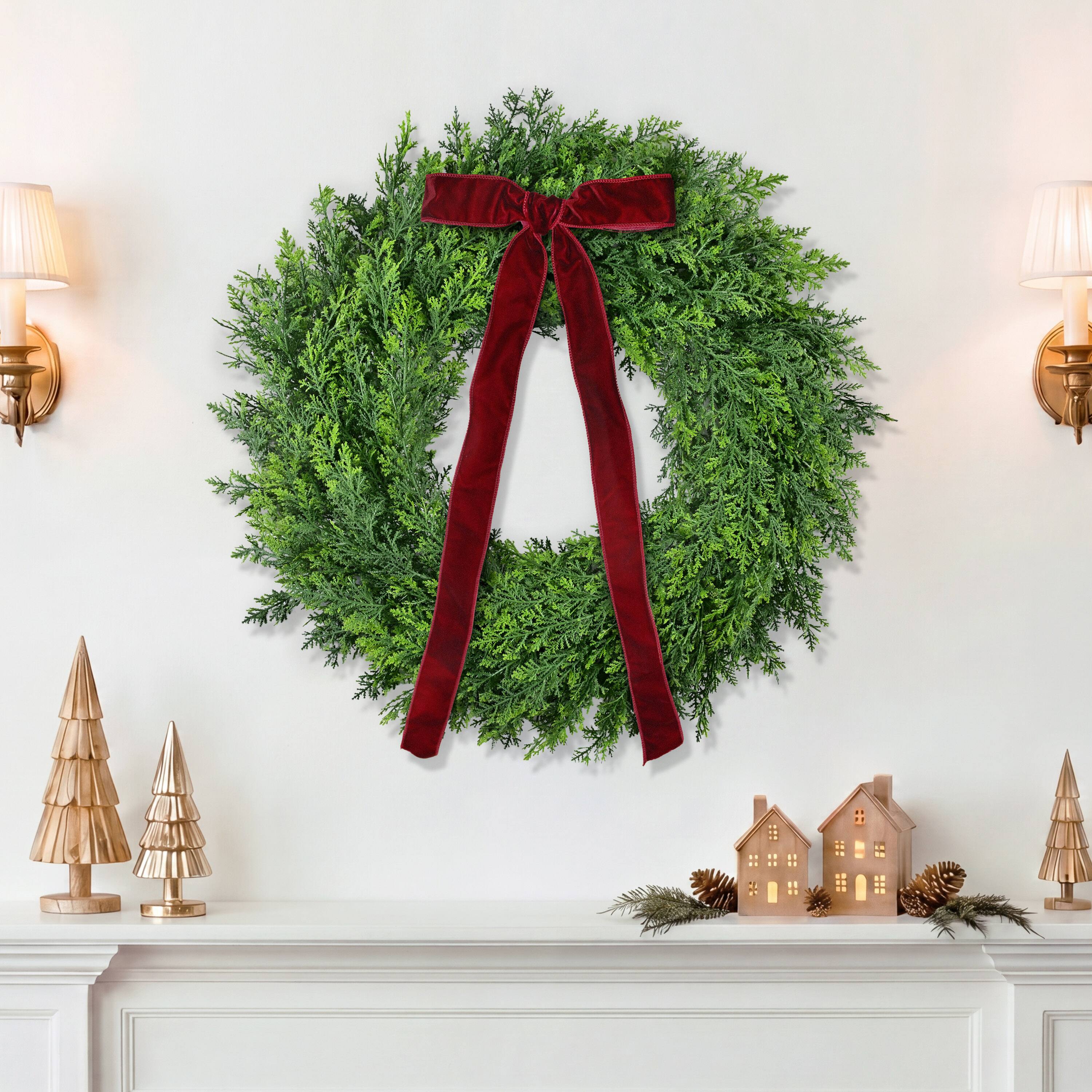 Puleo International 24" Unlit Green Polyethylene Spruce with Red Velvet Bow Artificial Wreath
