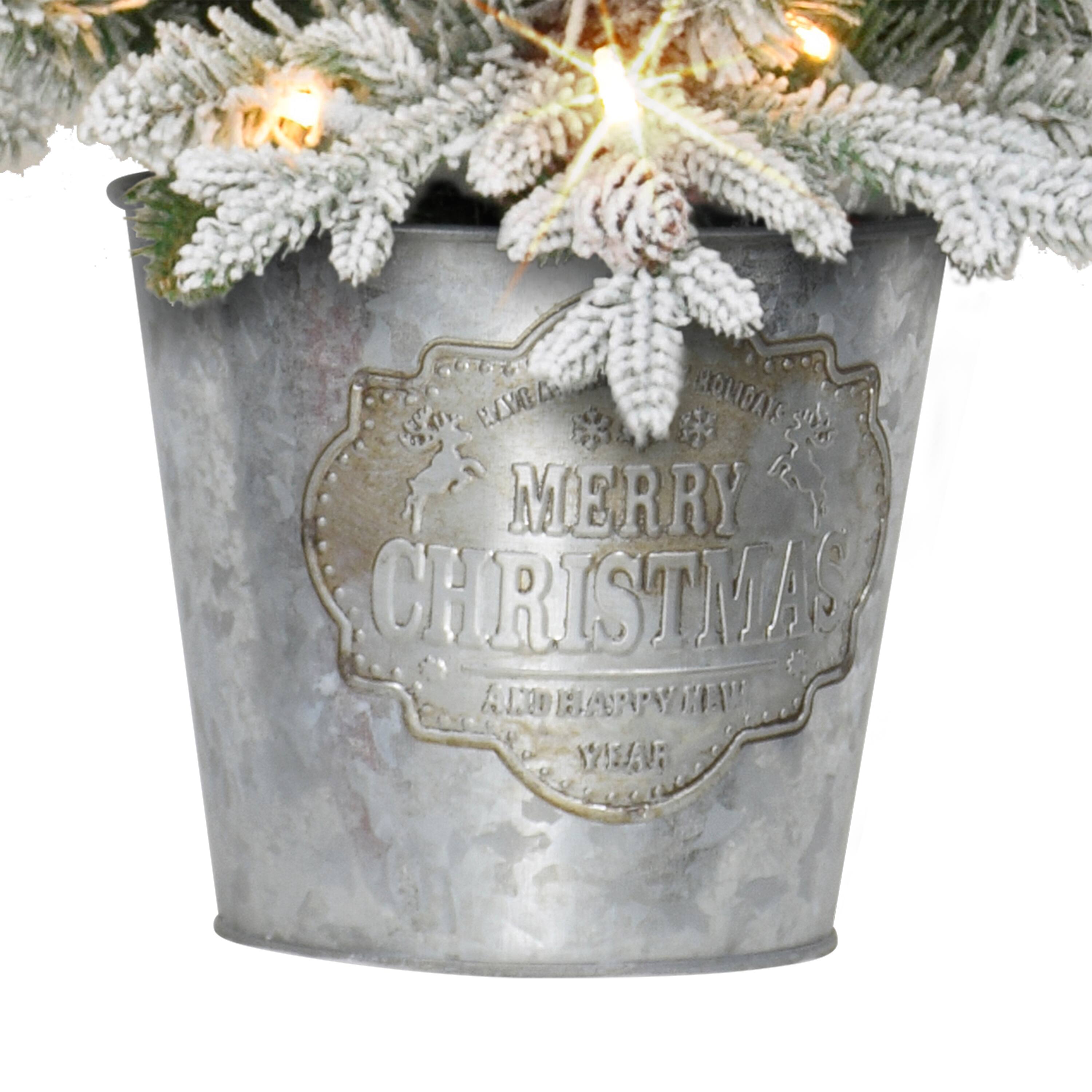 4.5ft. Pre-Lit Flocked Artificial Christmas Tree in Metal Planter, Clear Lights