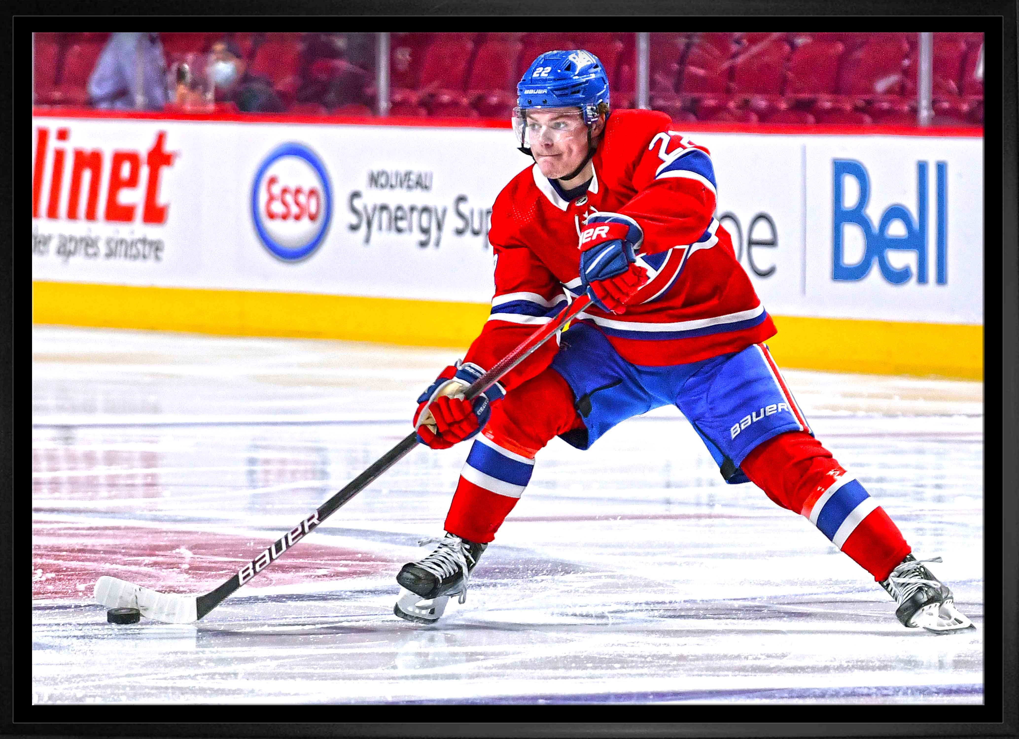 Cole Caufield Montreal Canadiens Framed 20" x 29" Passing Puck Canvas 31.5" x 22.5"
