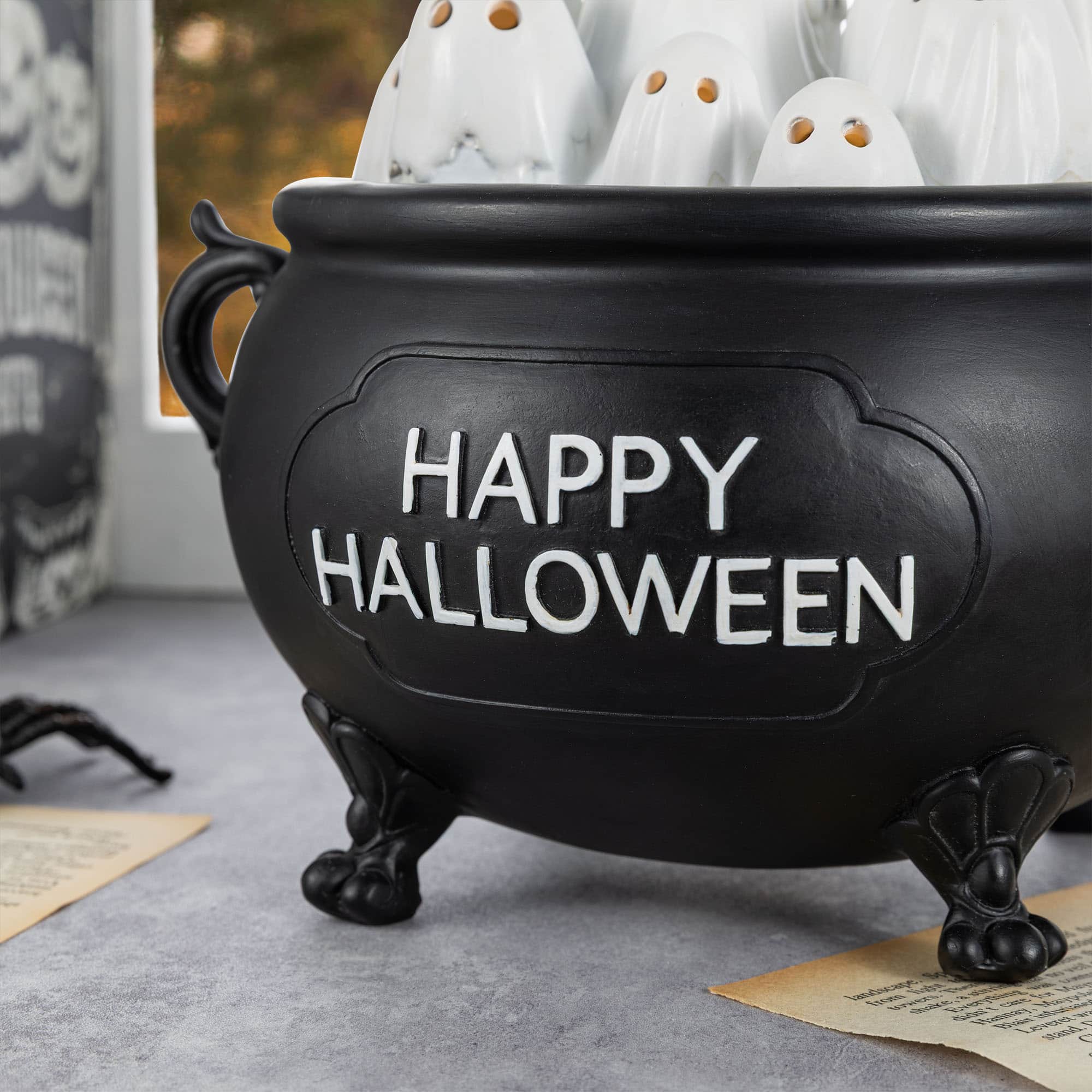 Glitzhome® 9" Halloween Lighted Polyresin Ghosts in Cauldron Table Decor with Timer