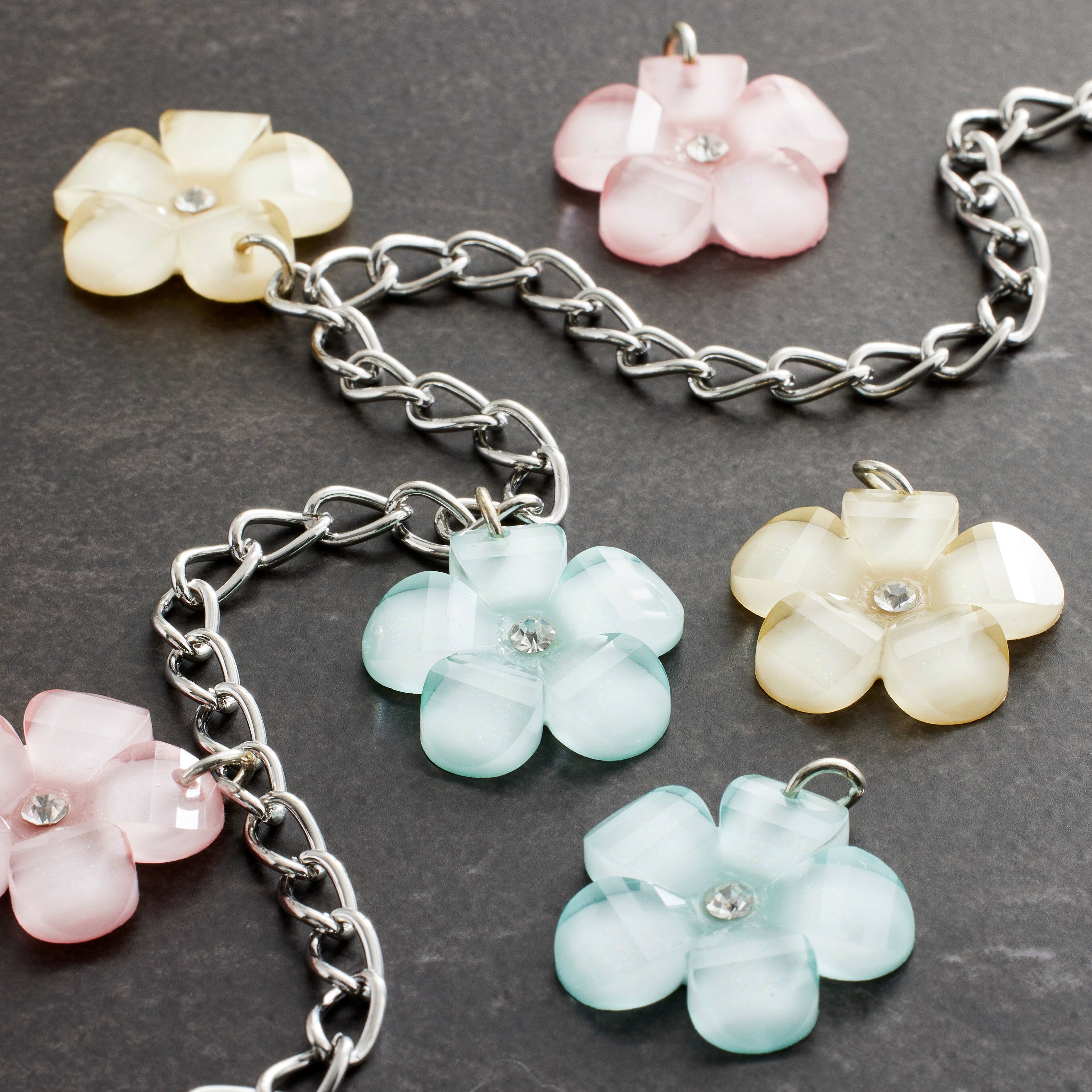 12 Packs: 6 ct. (72 total) Charmalong™ Rhodium Flower Charms by Bead Landing™