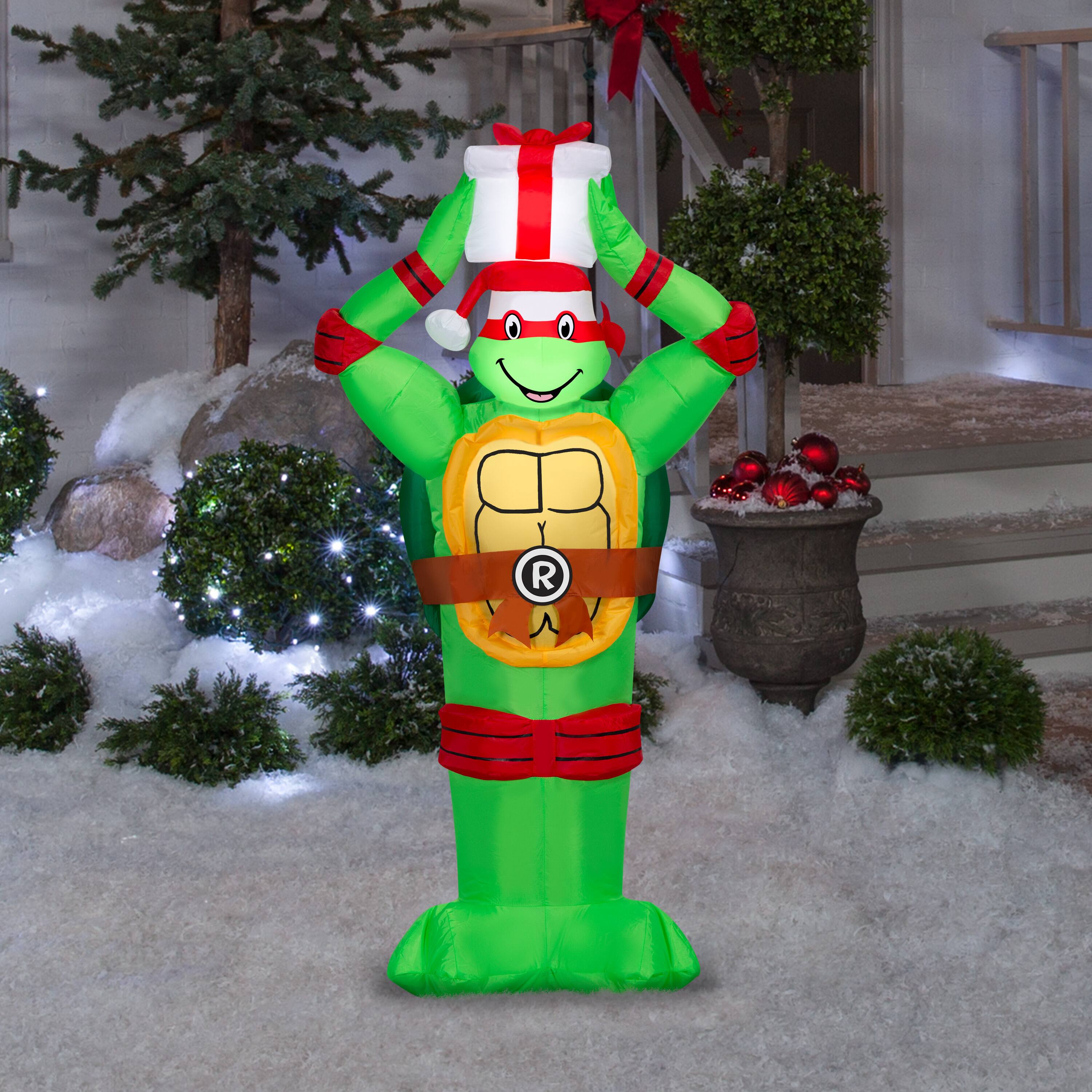 4ft. Airblown® Paramount Inflatable Classic Teenage Mutant Ninja Turtles Raphael with Present Christmas Light Décor