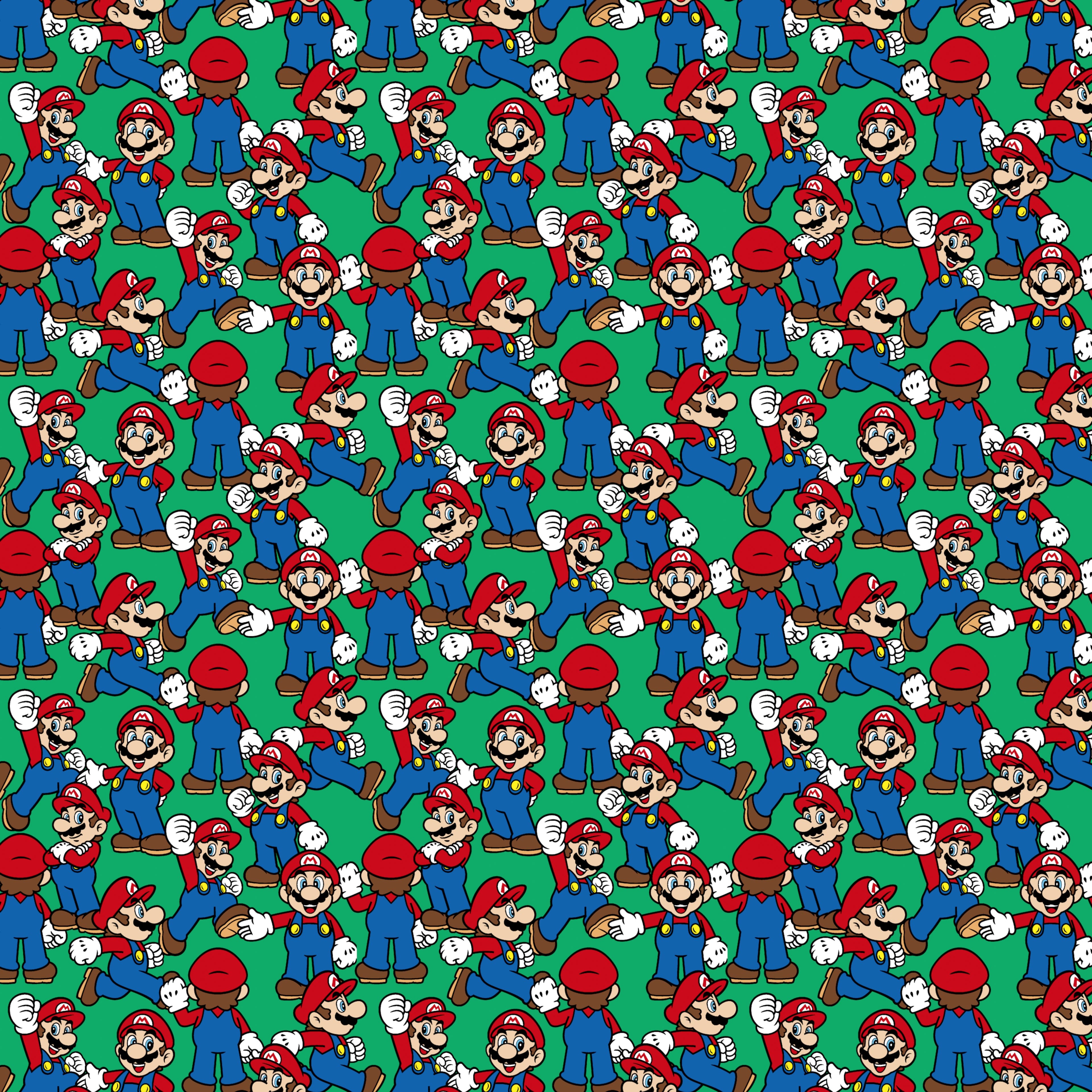 Nintendo® Mario on Green Background Cotton Fabric