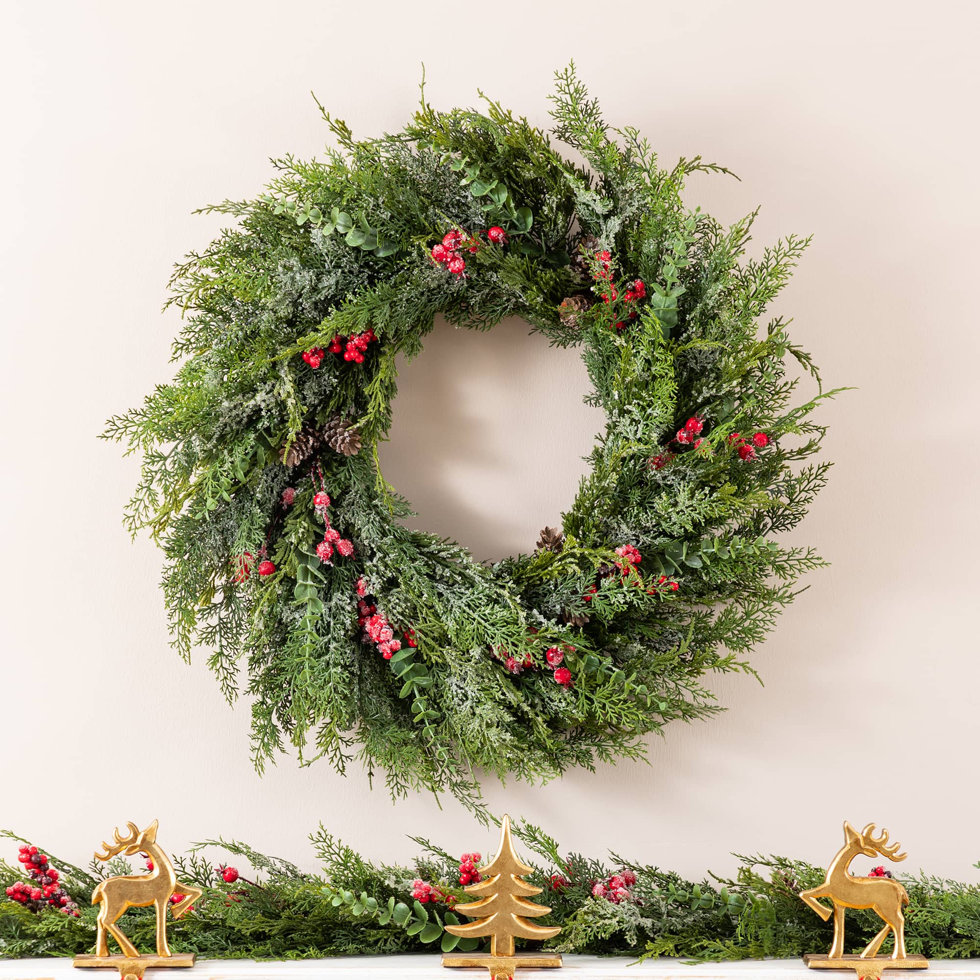 Glitzhome® 28" Christmas Greenery Frosted PE Wreath with Pinecones & Red Berries