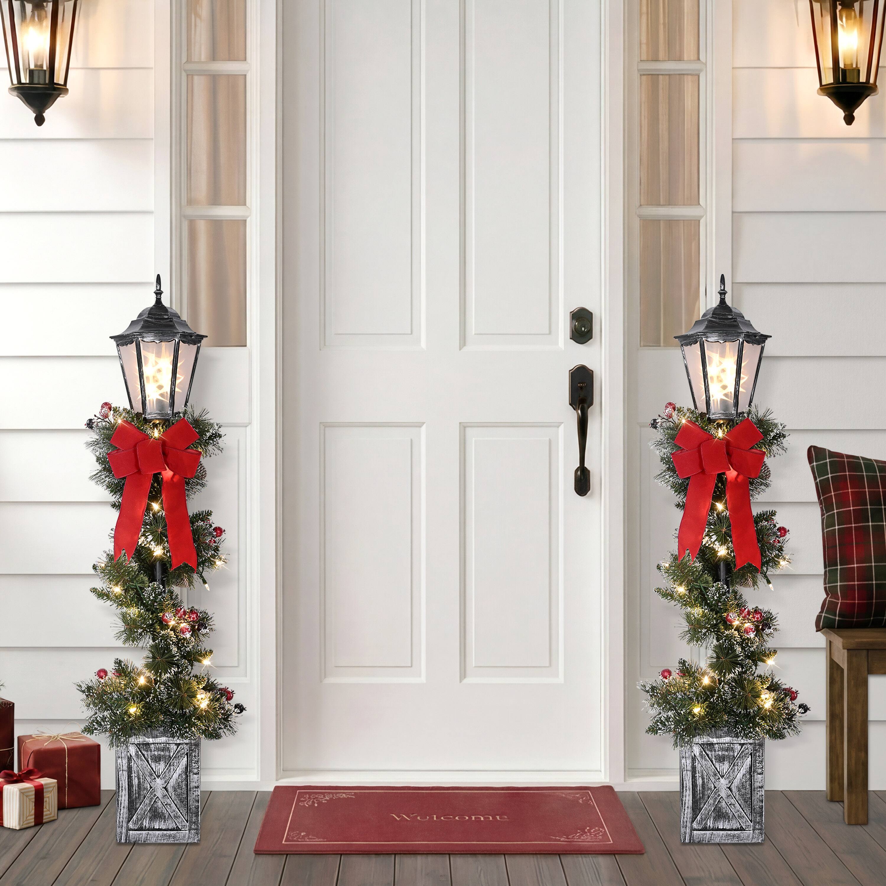 Puleo International 4ft. Pre-Lit Frosted Spiral Artificial Christmas Lamp Post with Decorative Pot Base, 2ct.