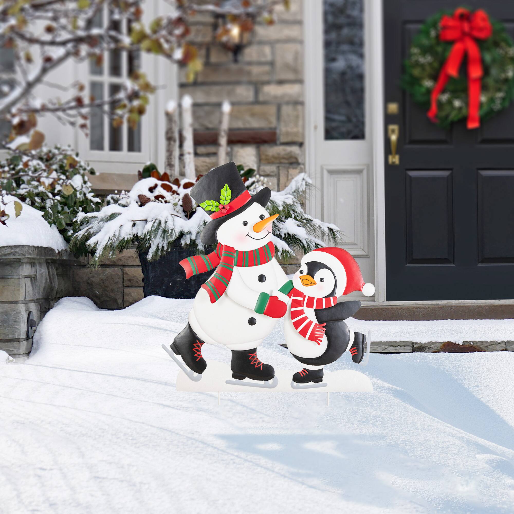 Glitzhome® 32" Christmas Metal Skiing Snowman and Penguin Yard Stake