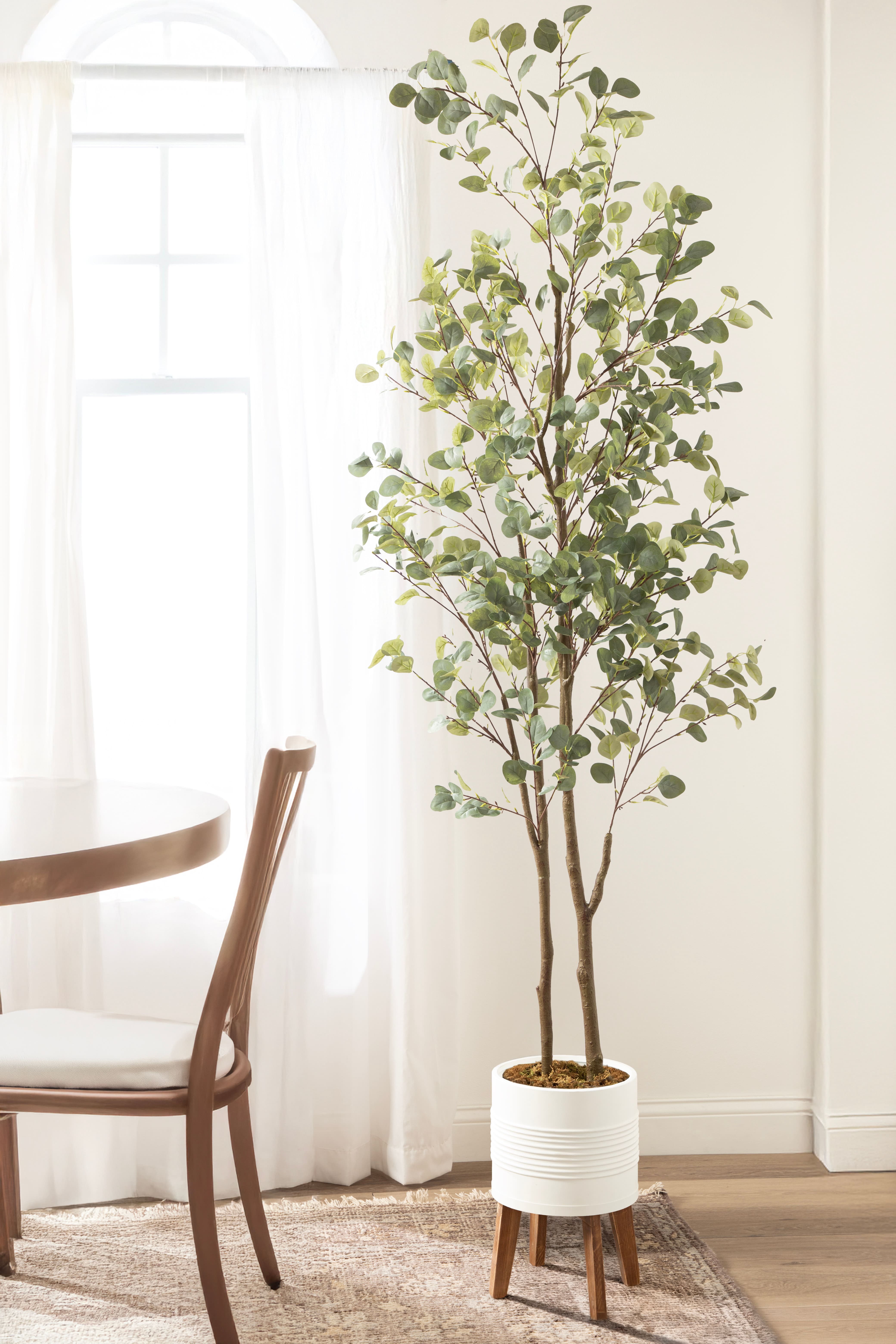 Kate and Laurel 8ft. Green Eudora Faux Eucalyptus Tree in Planter