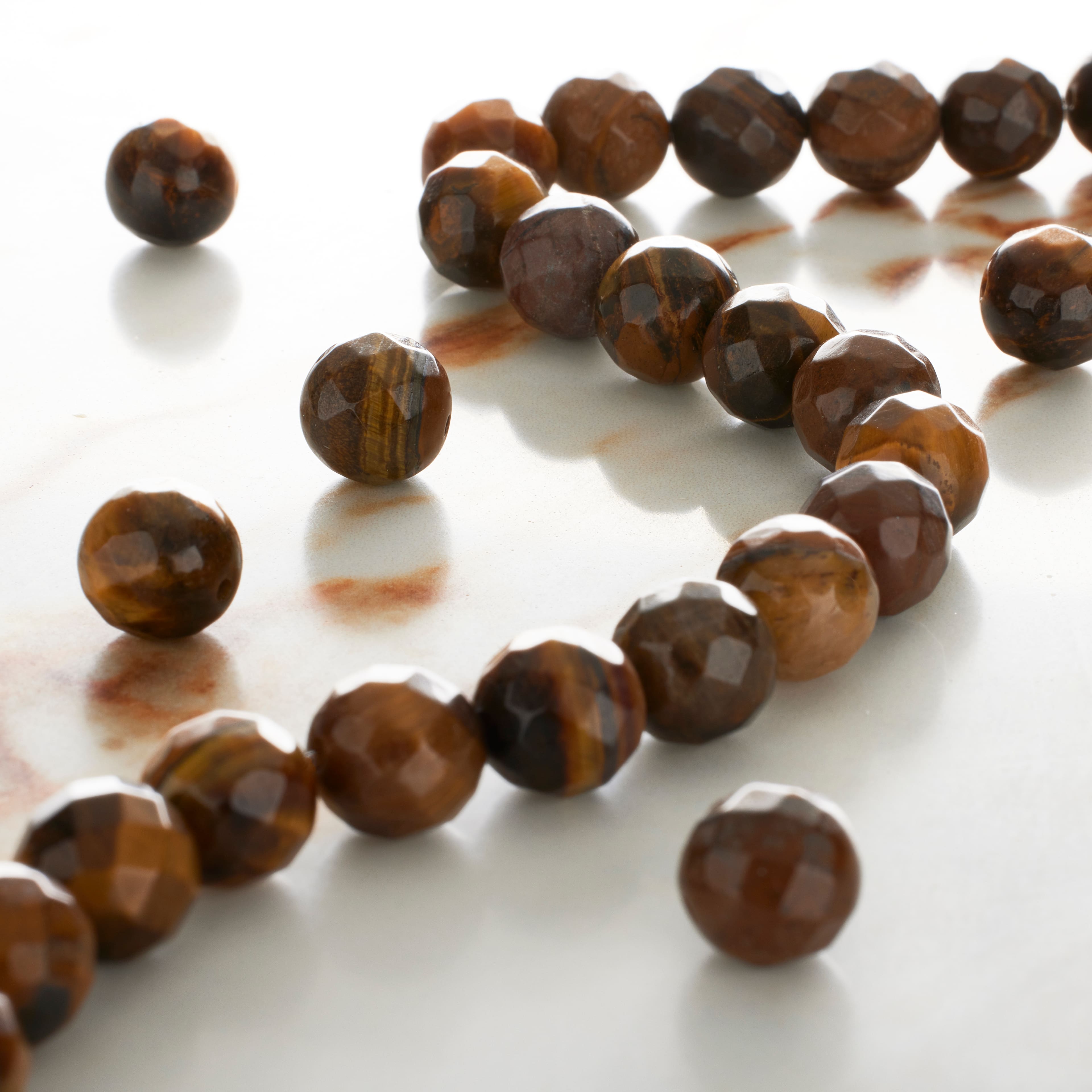 12 Pack: Yellow Tiger's Eye Faceted Round Beads, 10mm by Bead Landing™