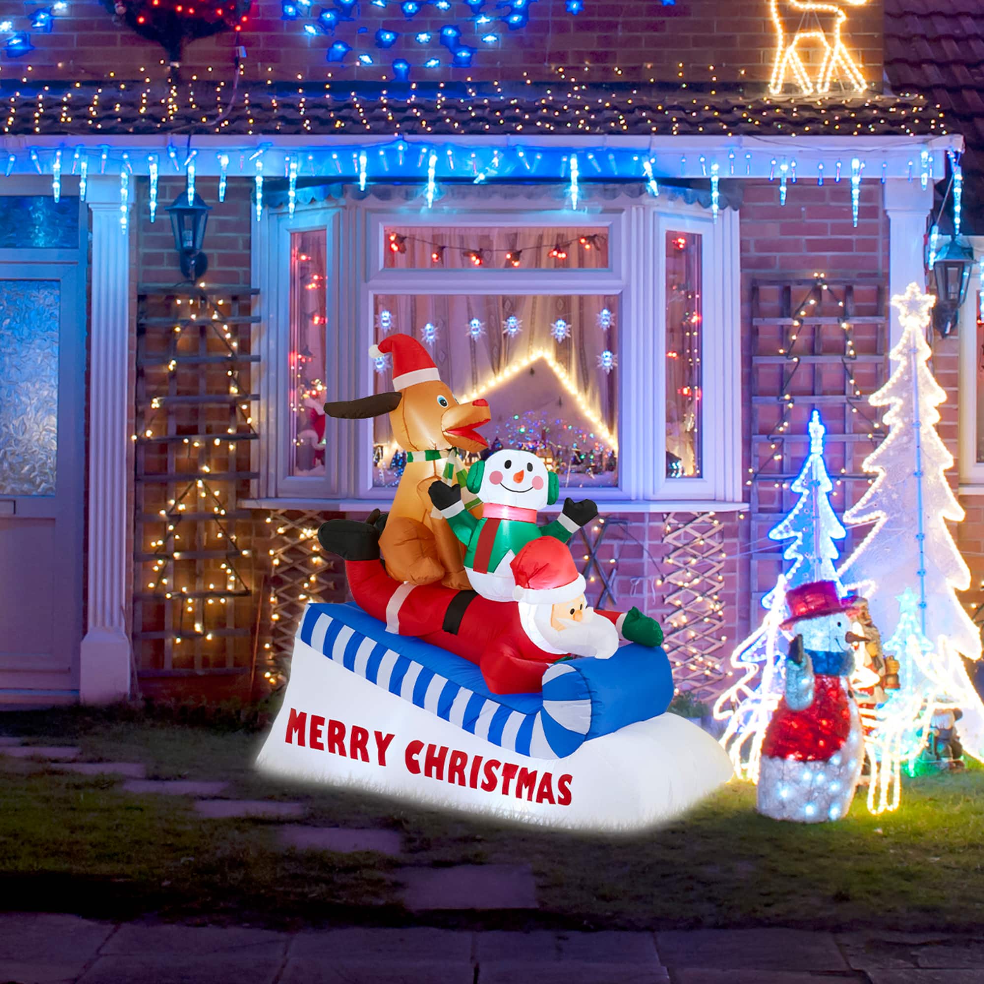 Glitzhome® 6FT Lighted Inflatable Skiing Santa, Snowman & Dog