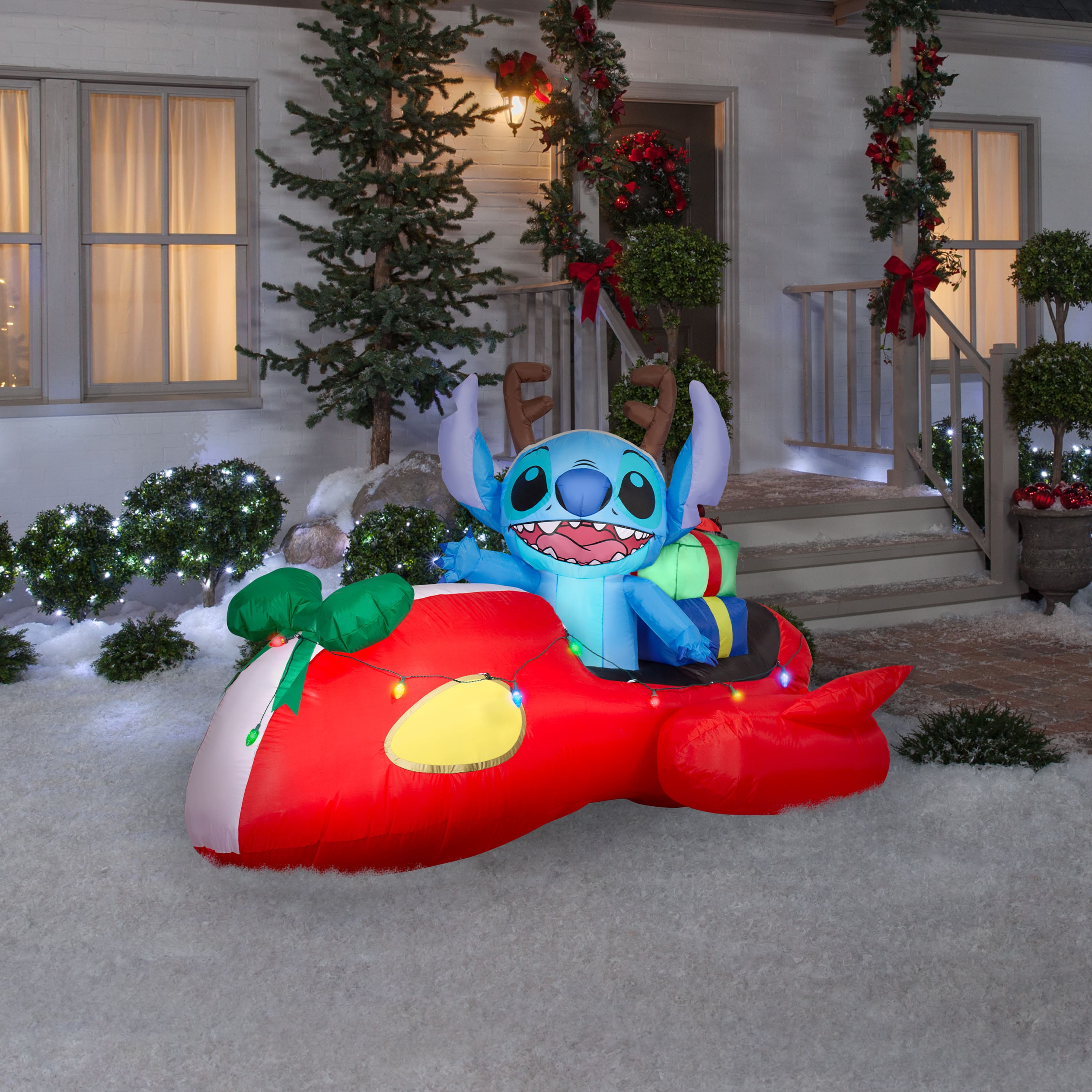4ft. Airblown® Disney® Inflatable Stitch in Red Speeder Car with Light String Christmas Décor