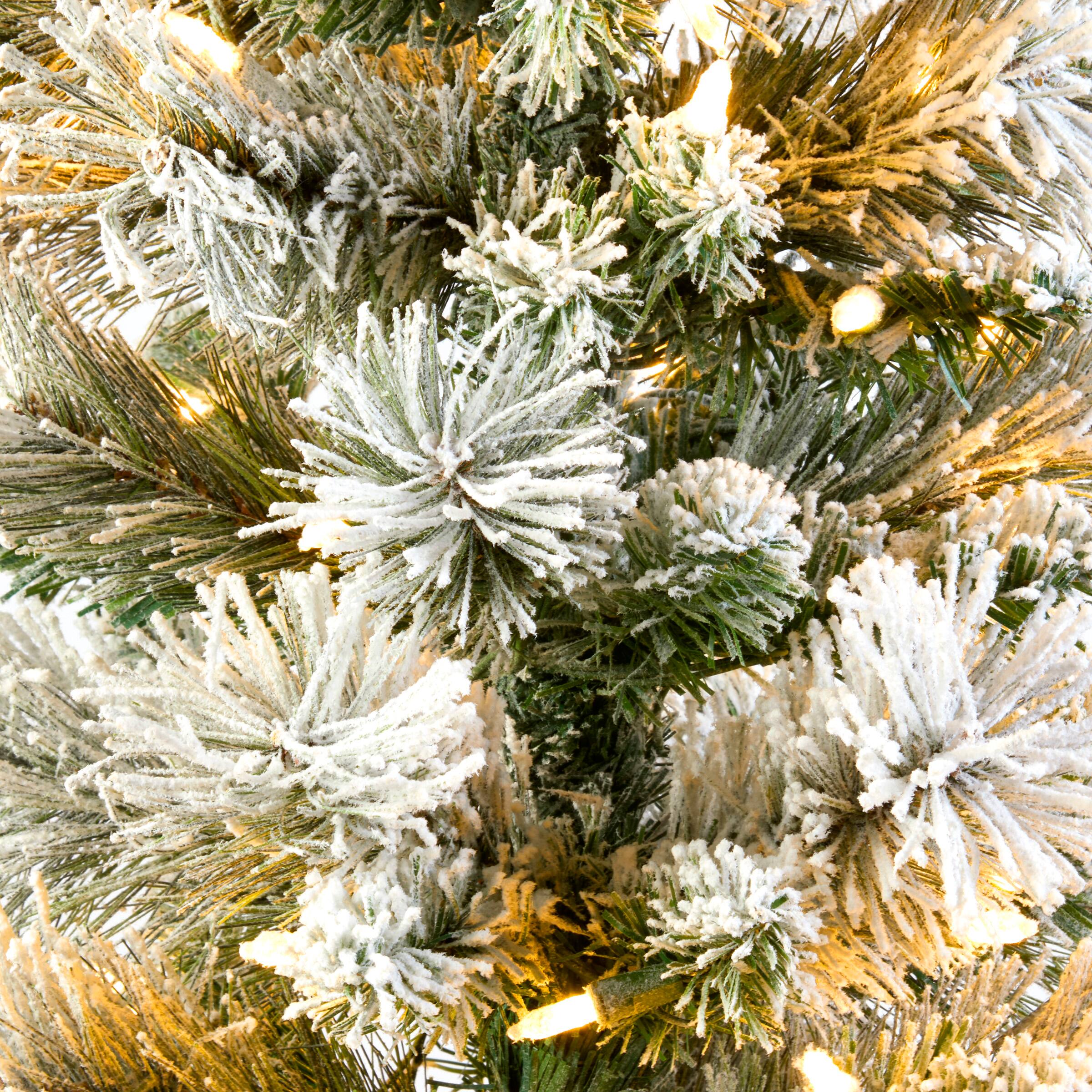 4.5ft. Pre-Lit Snowy Methow Pencil Artificial Christmas Entrance Tree in White Ceramic Base, Warm White LED Lights