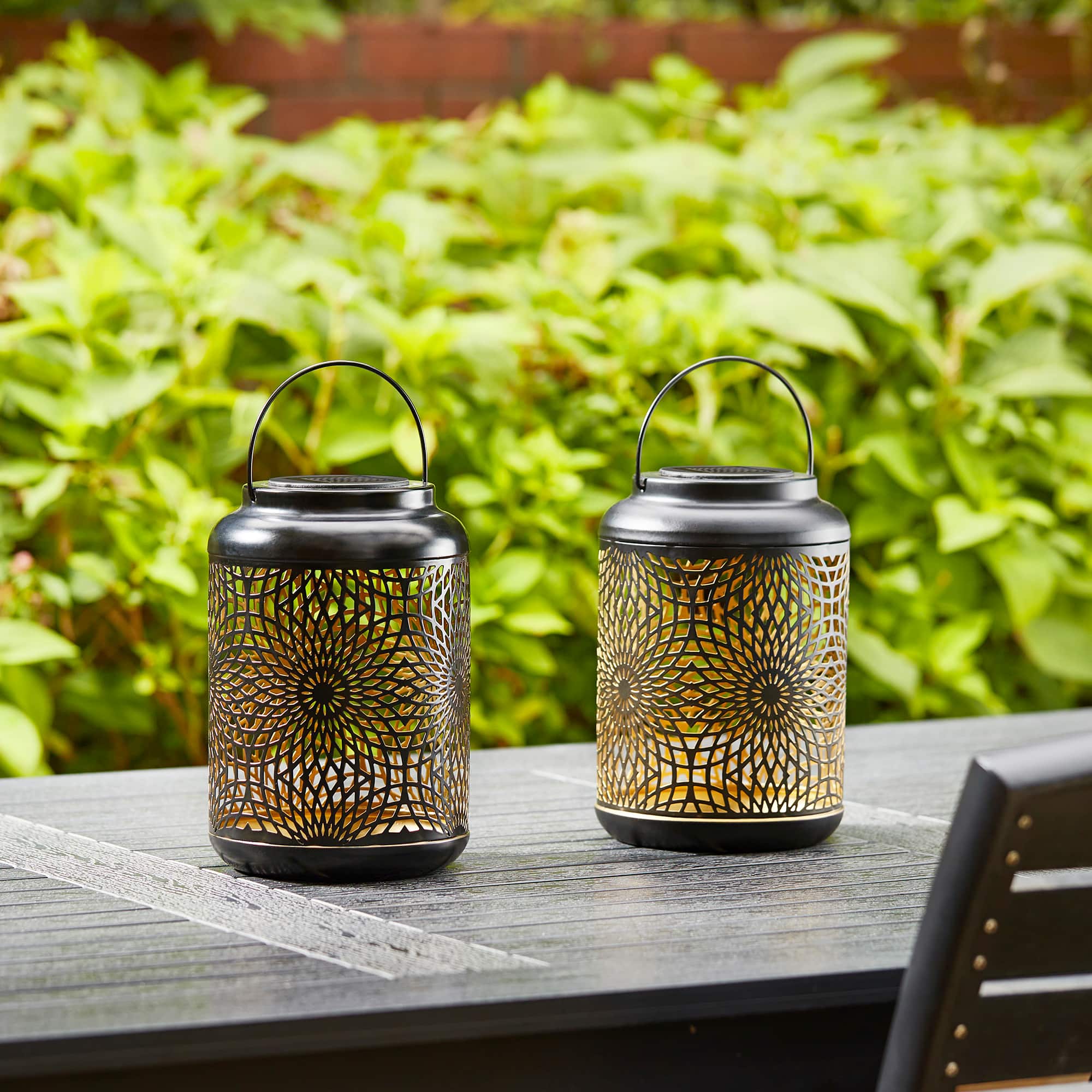 Glitzhome® 8.75" Metal Cutout Solar Powered Hanging Lantern Set
