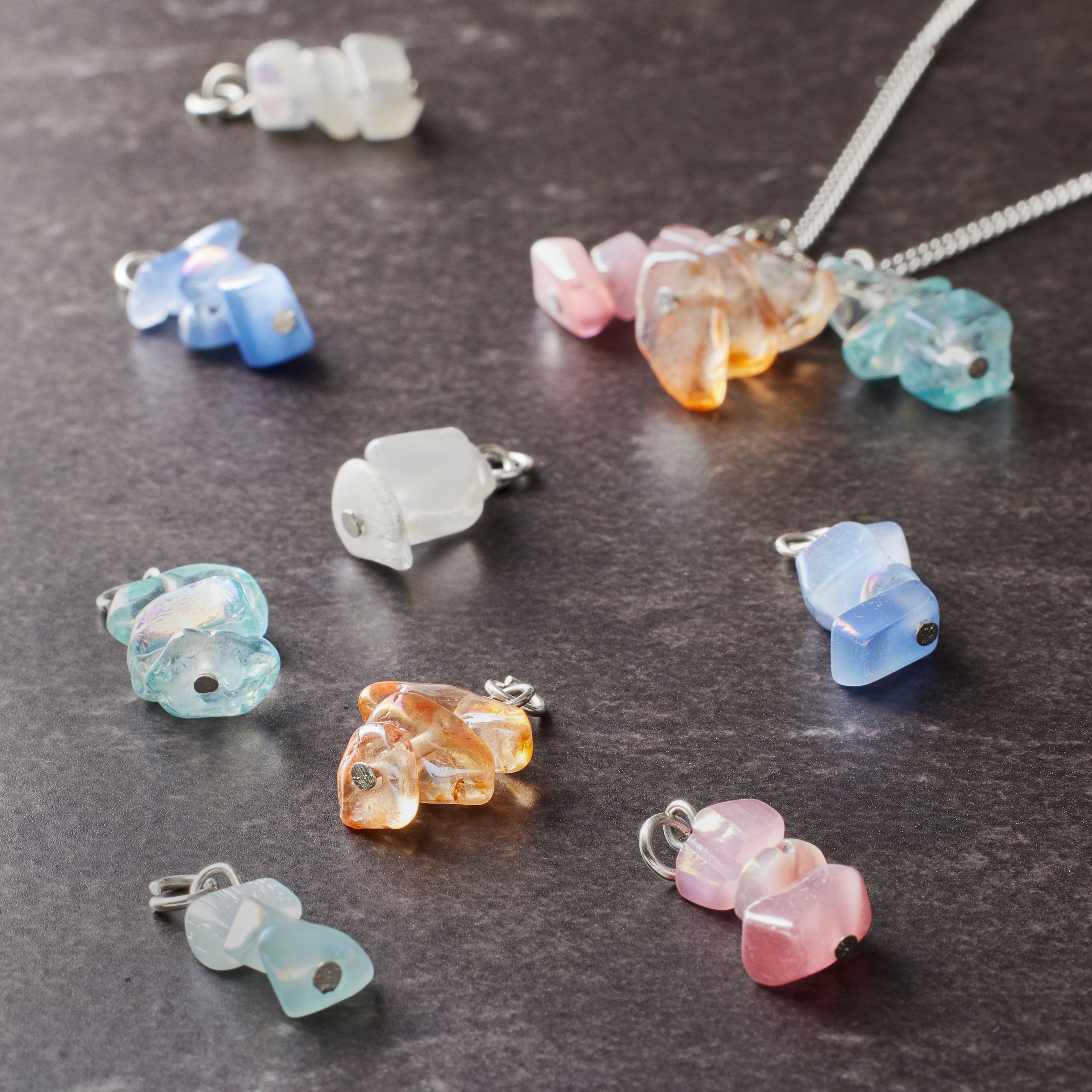 12 Packs: 12 ct. (144 total) Charmalong™ Stone Charms by Bead Landing™