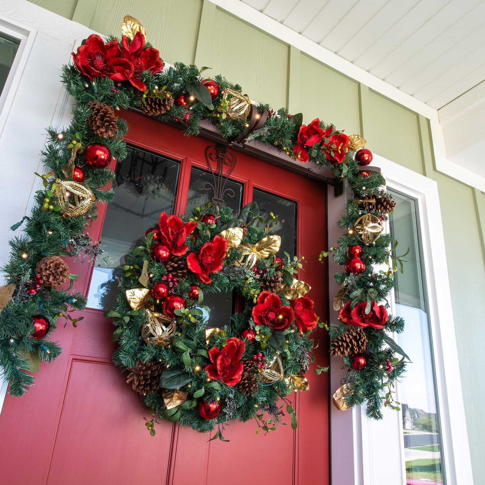 Village Lighting 9ft. Pre-Lit LED Red Magnolia Christmas Garland