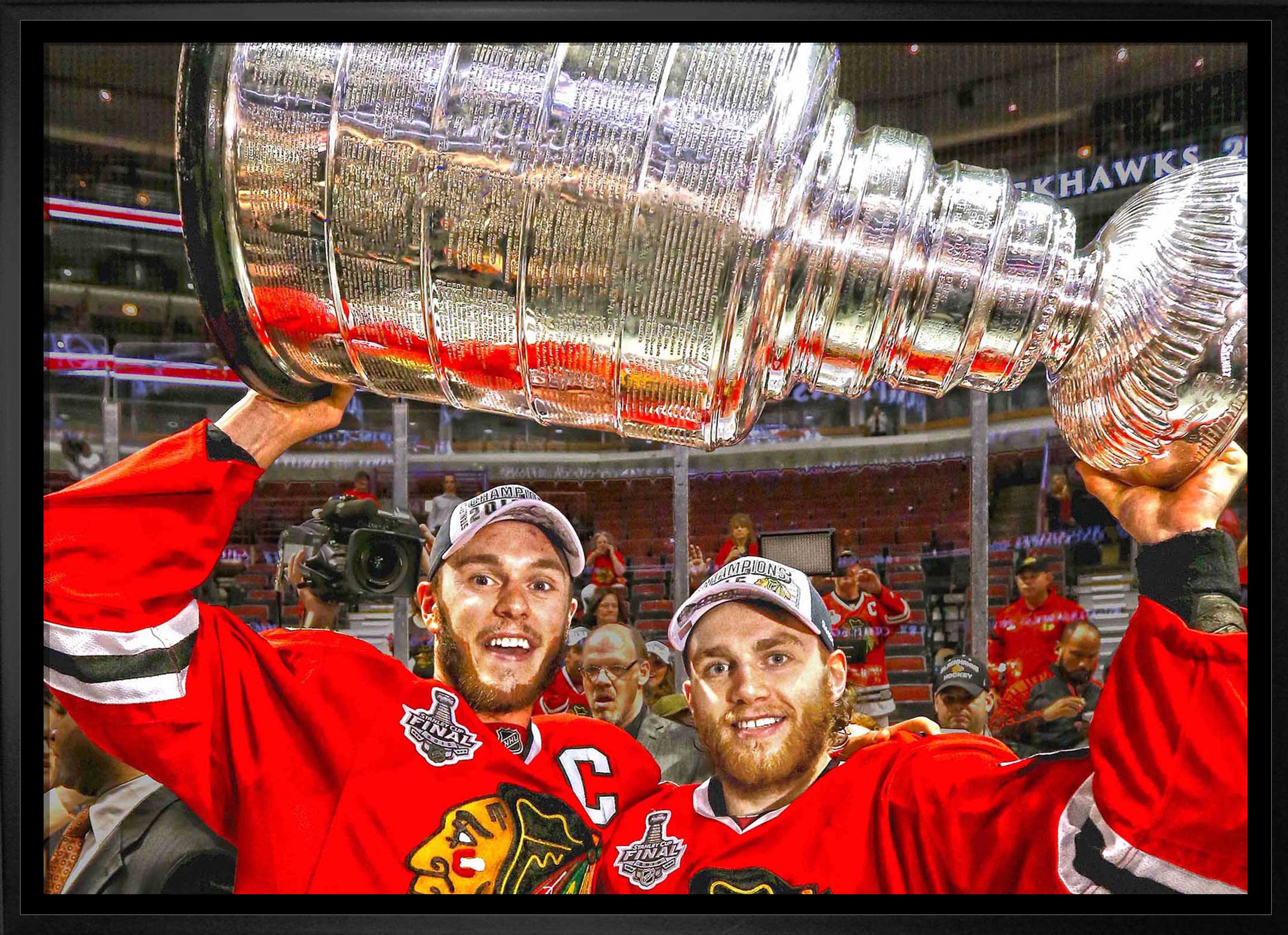 Jonathan Toews & Patrick Kane Chicago Blackhawks Framed 20" x 29" Lifting Stanley Cup Canvas 31.5" x 22.5"
