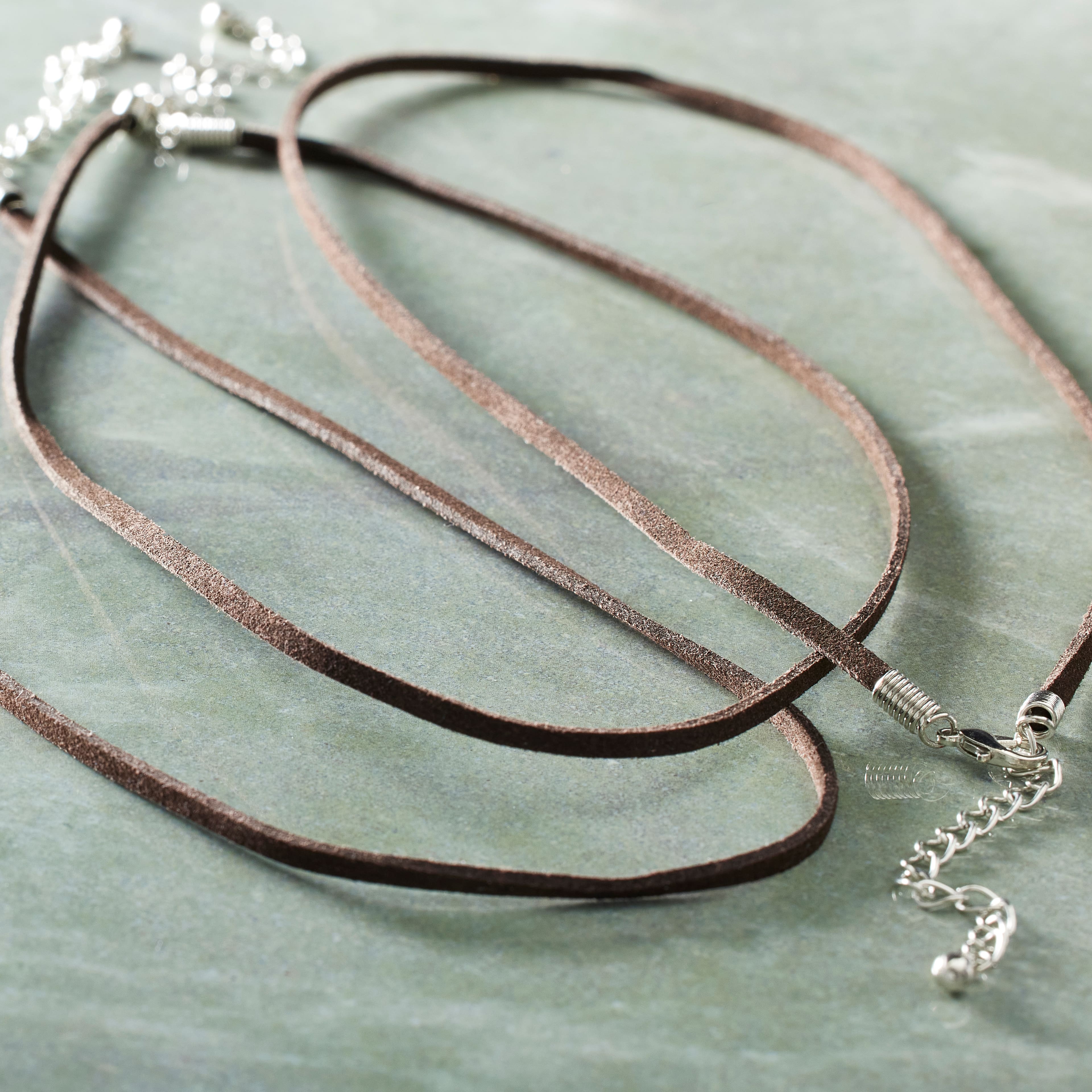 12 Packs: 3 ct. (36 total) Brown Suede Necklace by Bead Landing™