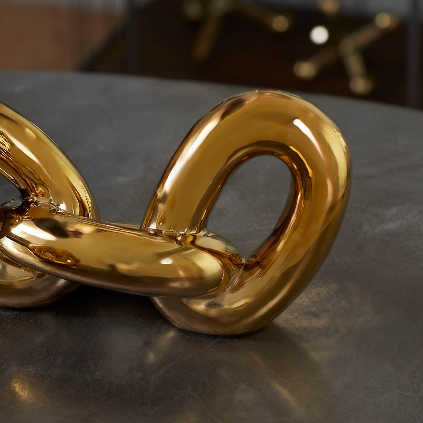 CosmoLiving by Cosmopolitan Gold Porcelain Glam Chain Sculpture Set