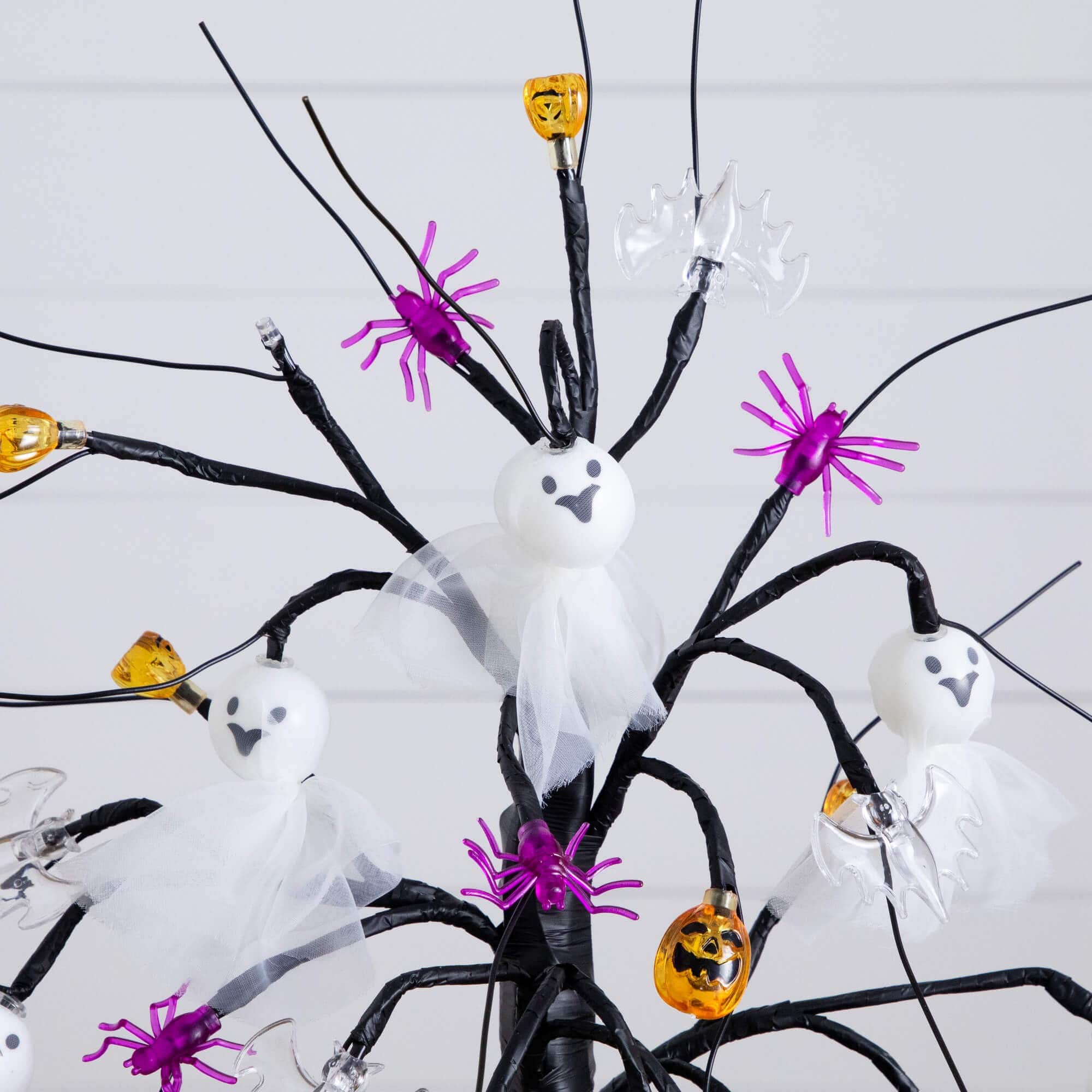 18in. Pre-Lit Artificial Halloween Ghost Dolls, Spiders, Bats & Pumpkins 24 LED Lighted Ornament Tree