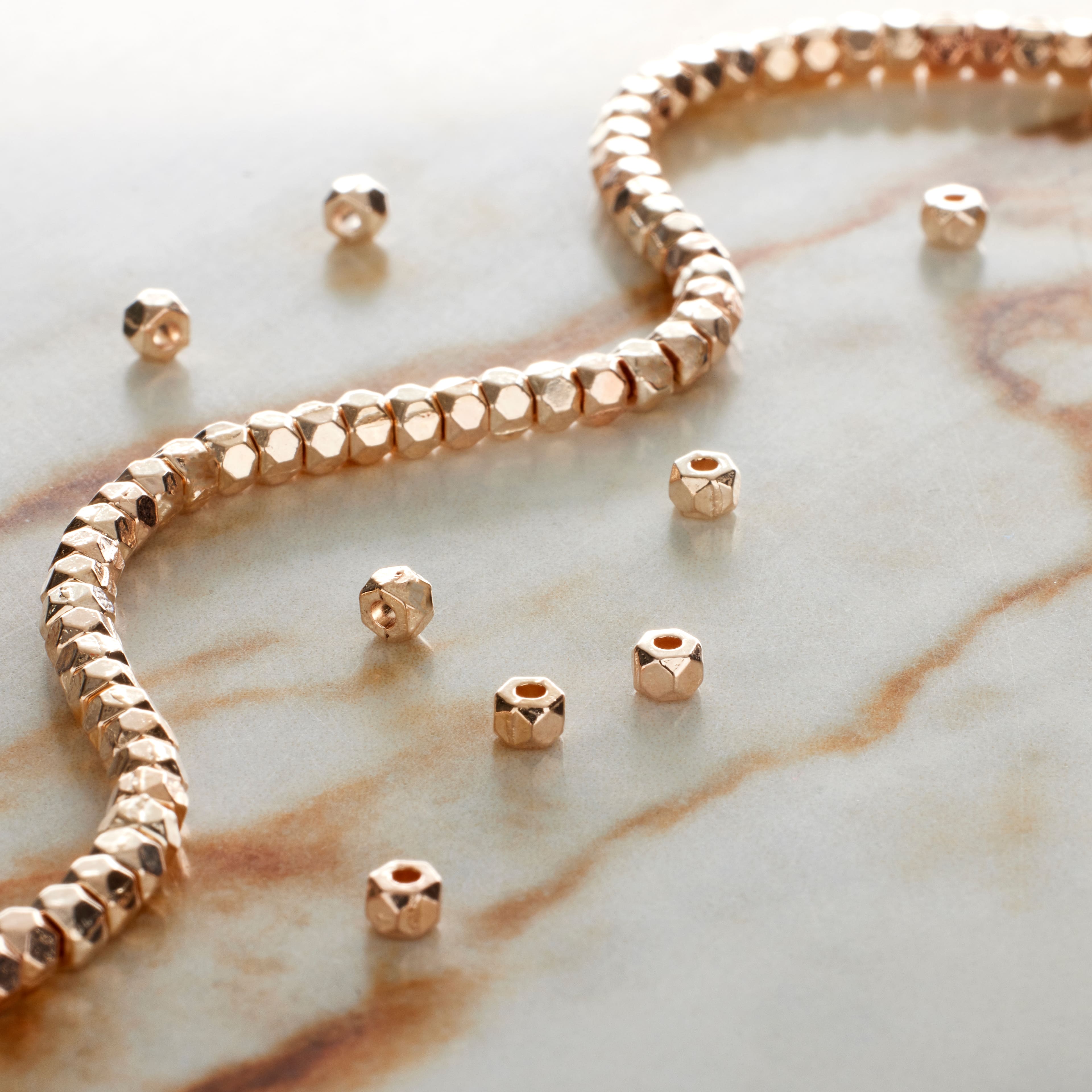 12 Pack: Rose Gold Faceted Metal Cube Beads, 3mm by Bead Landing™