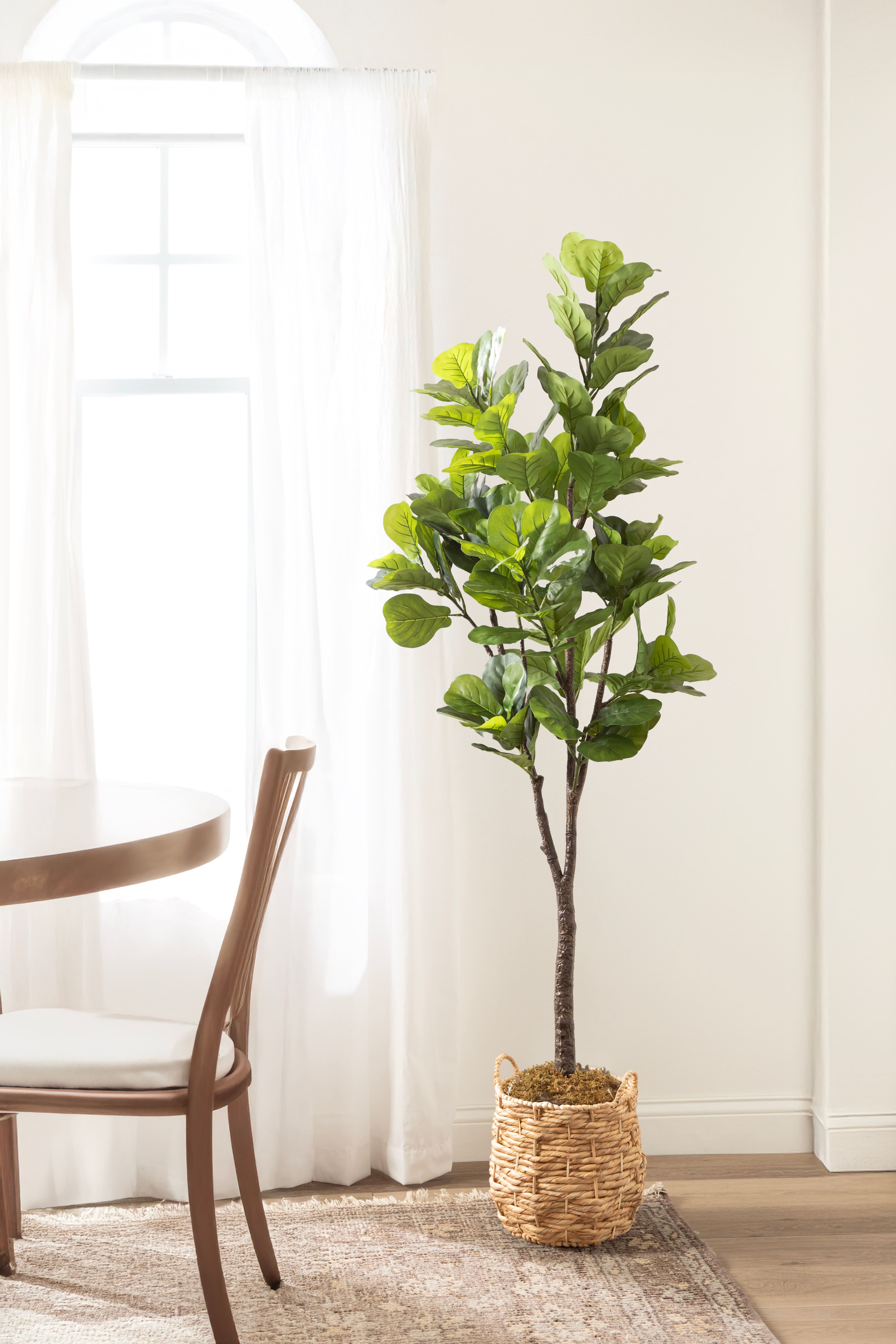 Kate and Laurel 6ft. Fidmont Faux Fiddle Fig Tree with Natural Planter