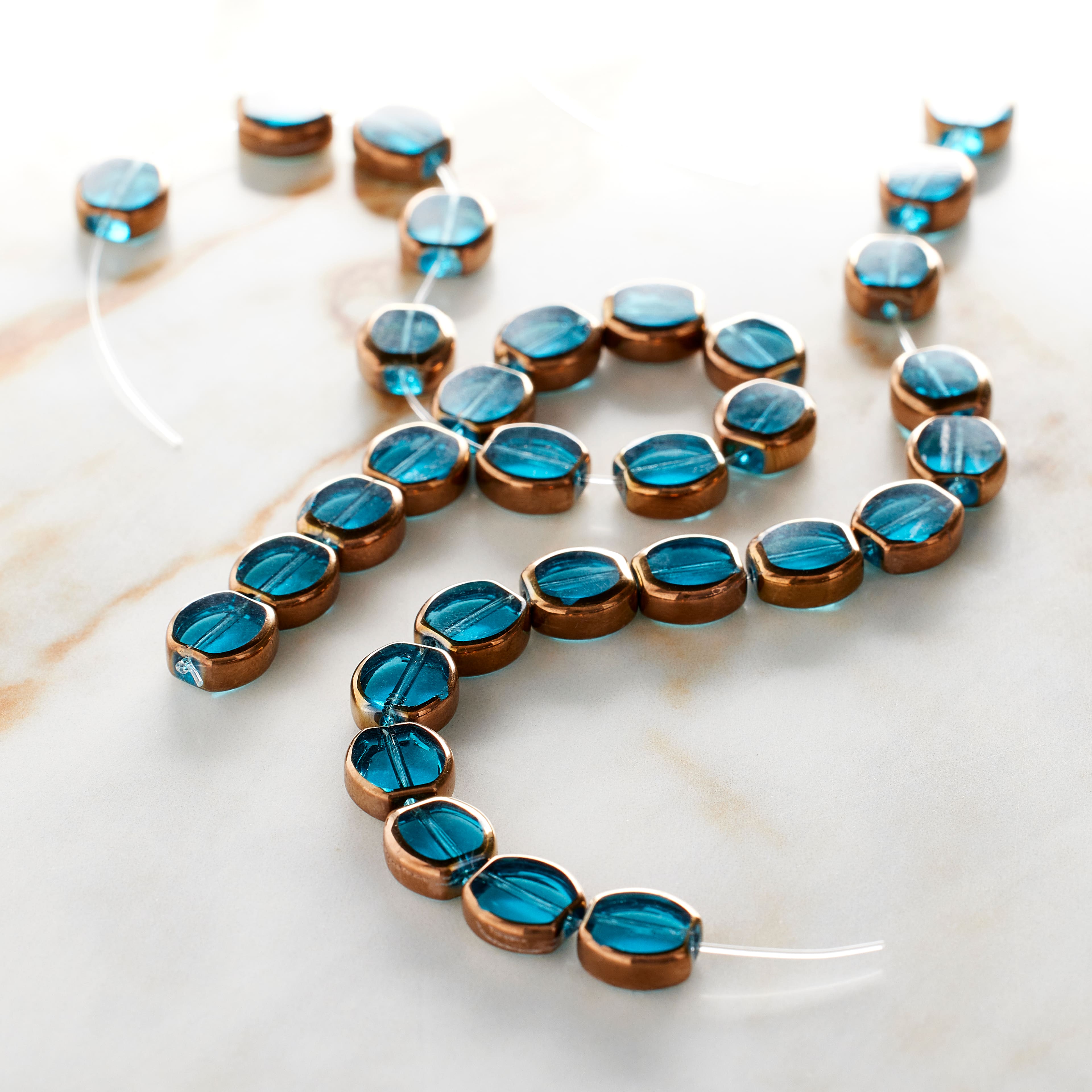 12 Pack: Aqua Table Cut Glass Beads, 10mm by Bead Landing™