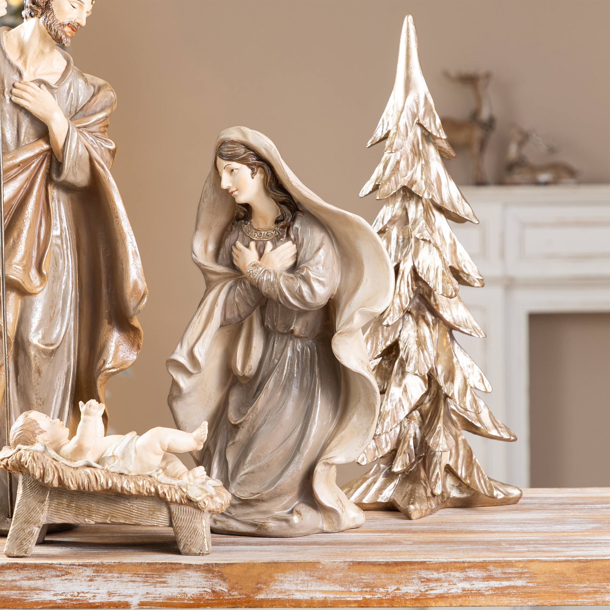 Glitzhome® 5-Piece Brown Resin Holy Family & Christmas Trees Figurine Set