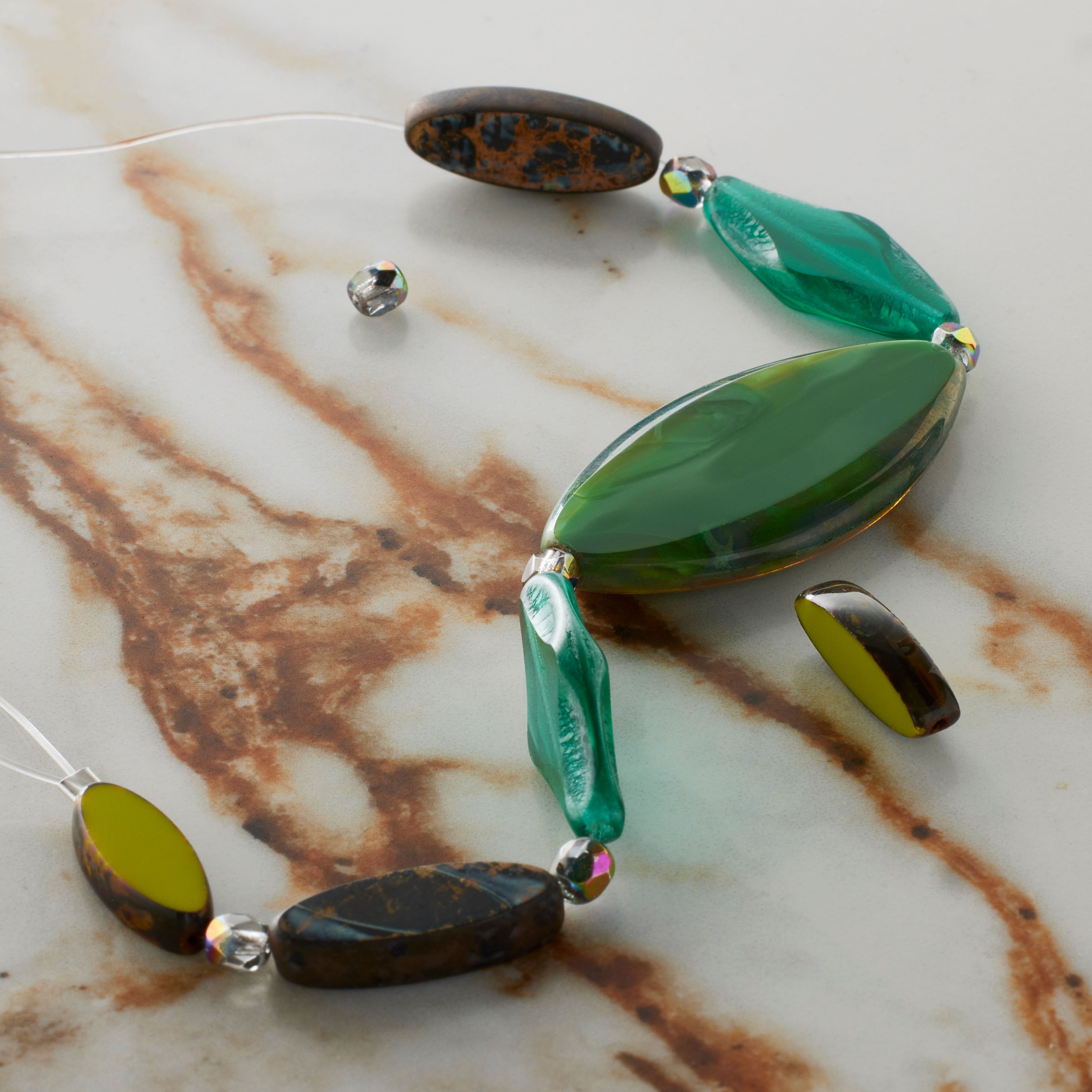 Smooth Green Czech Glass Oval Bead Mix by Bead Landing™