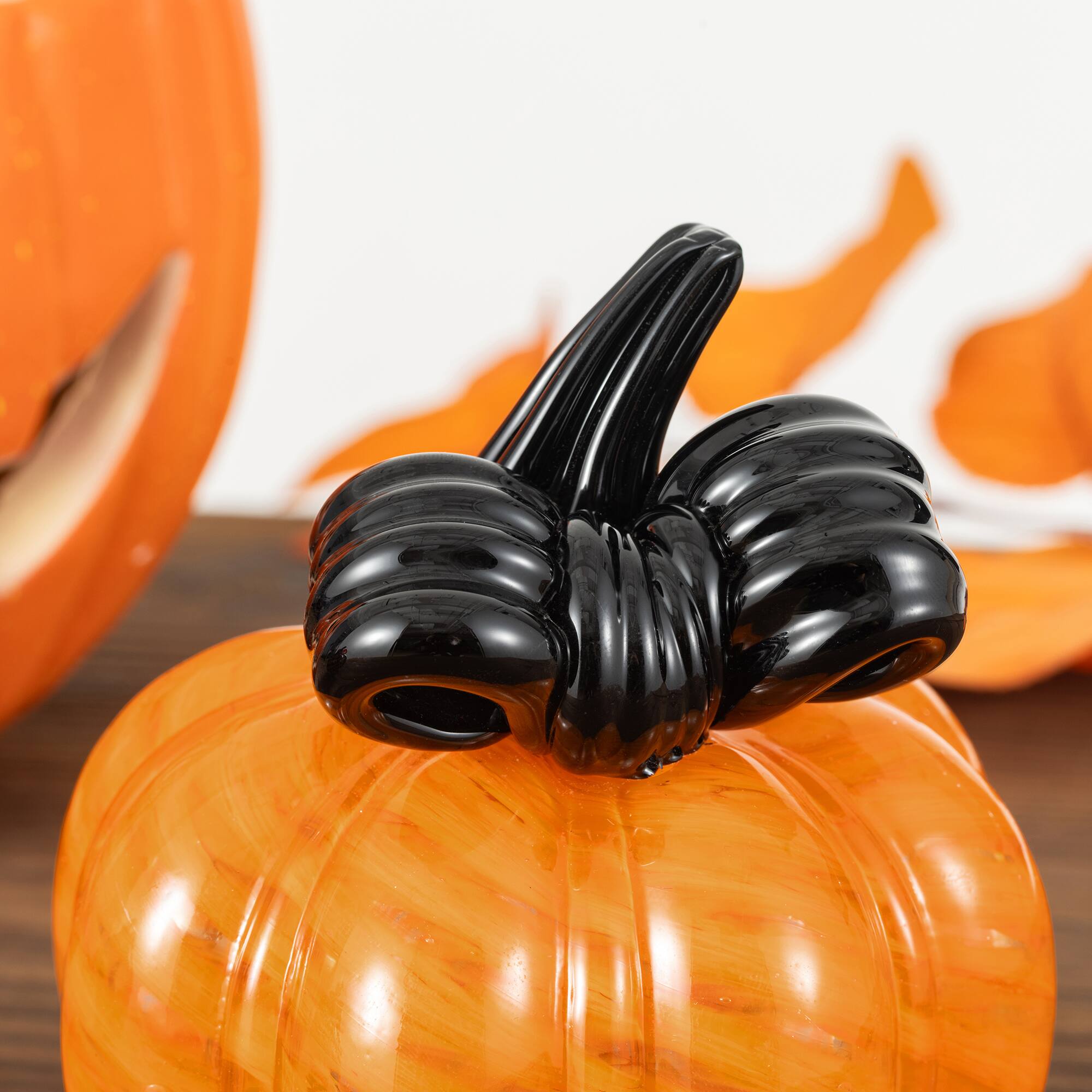 Glitzhome® 4.75" Halloween Striped Glass Pumpkin with Bow
