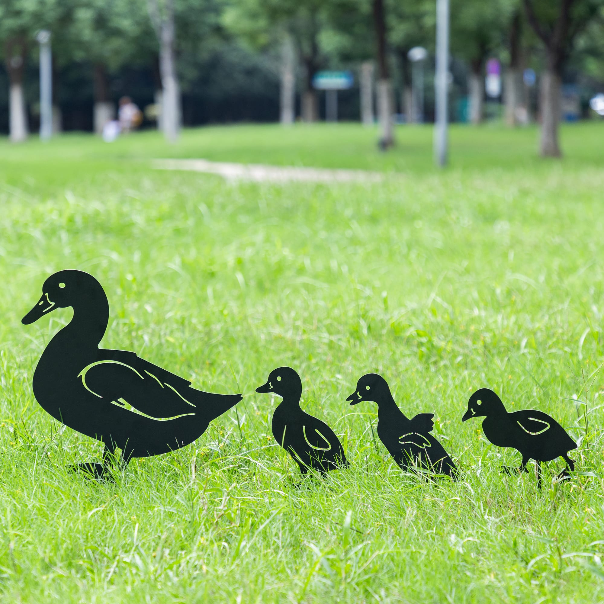 Glitzhome® 18" 2-in-1 Set of 4 Painted Metal Duck Silhouette Garden Picks & Wall Decor