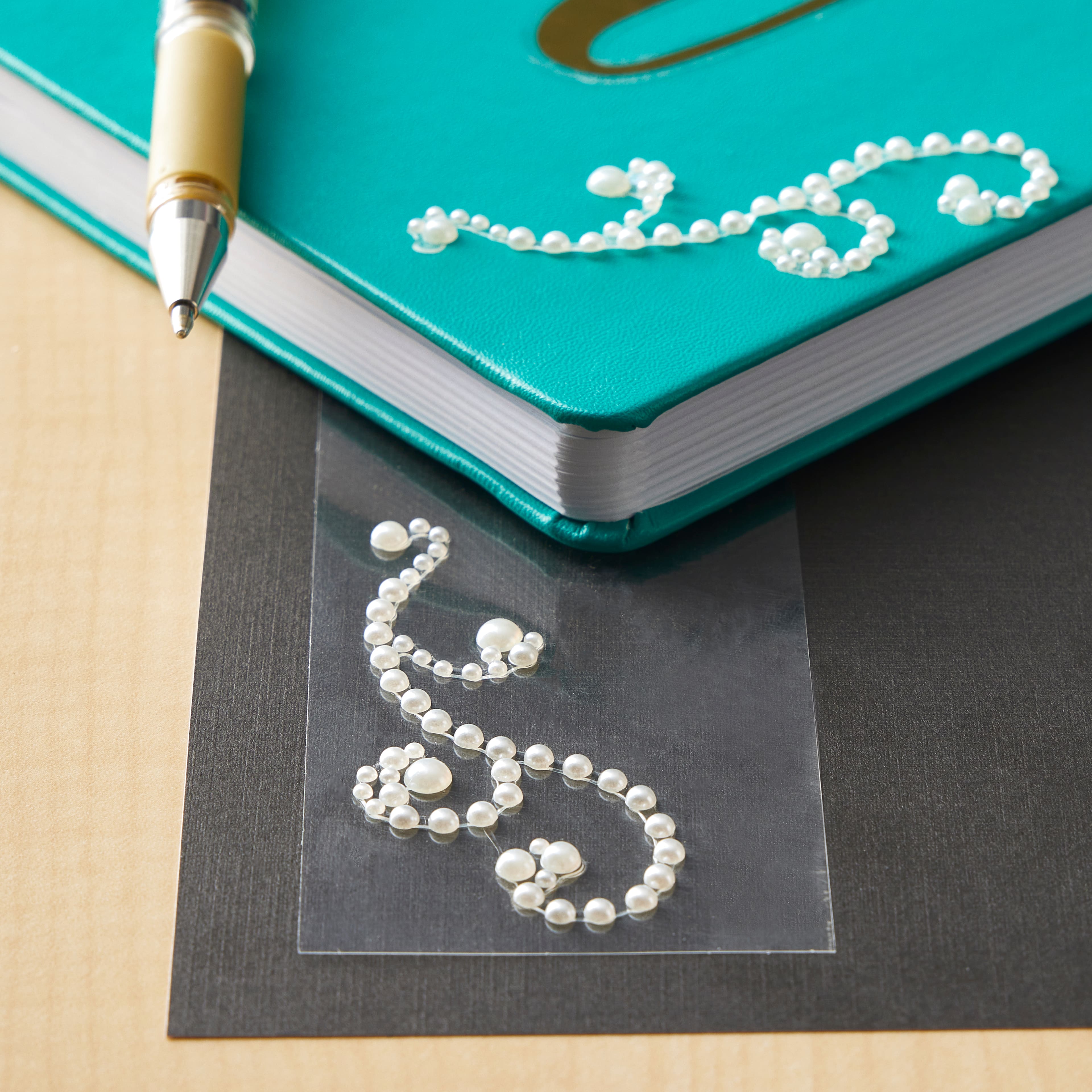 12 Packs: 2 ct. (24 total) Adhesive Pearl Flourishes by Recollections™