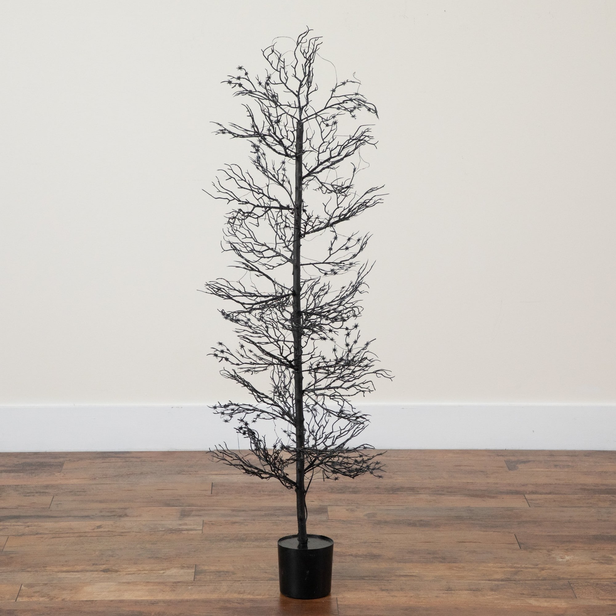 4ft. Pre-Lit Artificial Halloween Spider Twig Tree with 100 Orange & Purple LED Lights