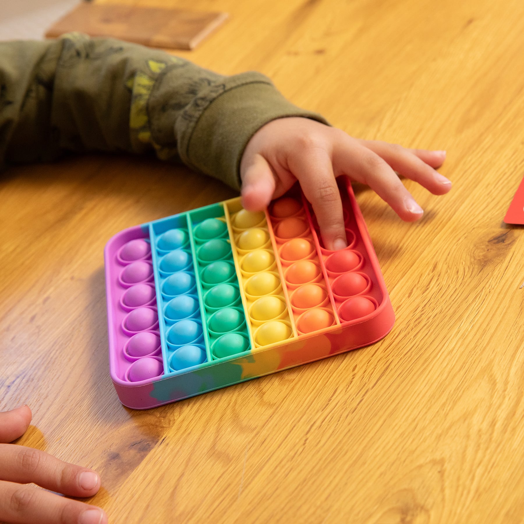 The Fidget Game 5" x 5" Rainbow Pop It Mats, 4ct.