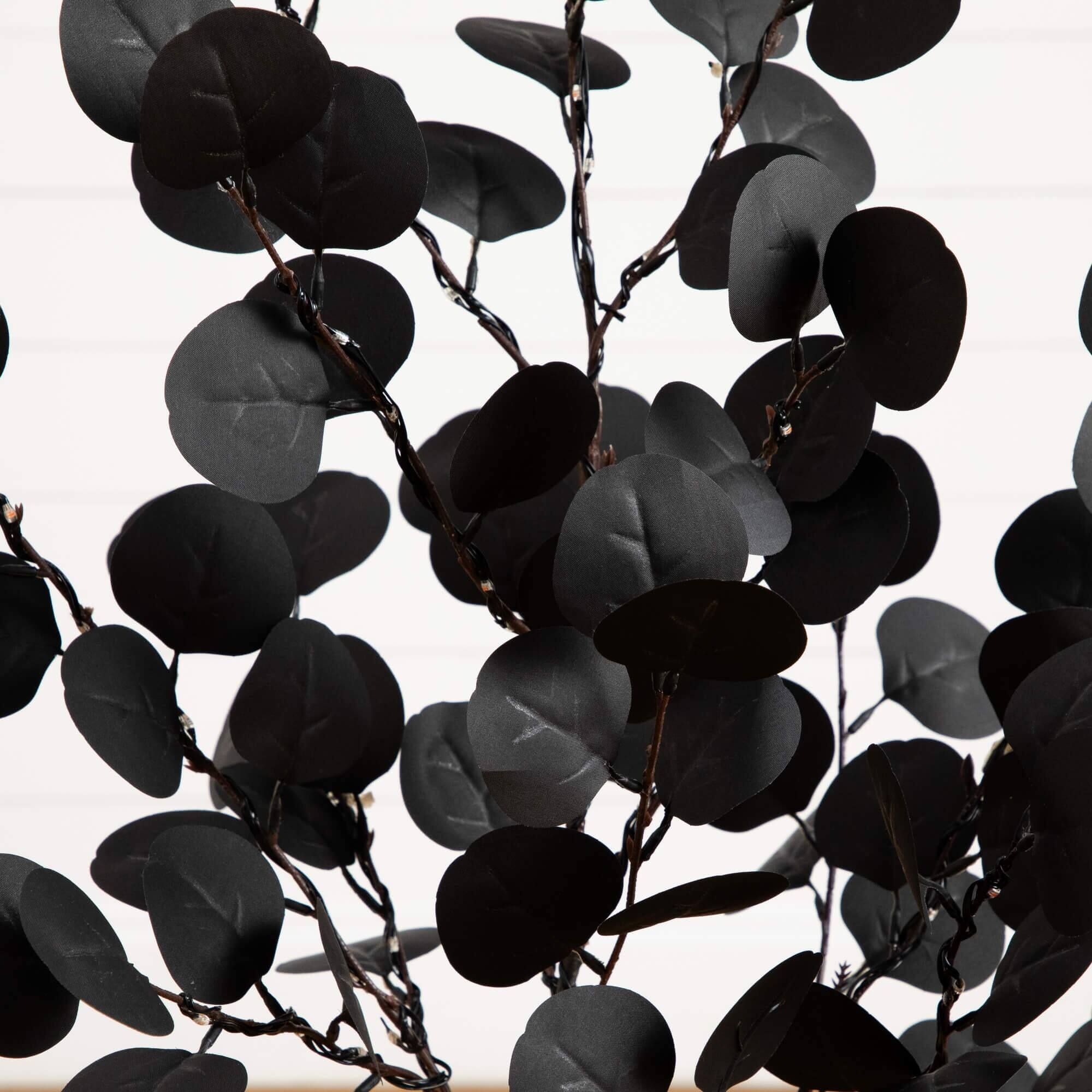 3ft. Pre-Lit Artificial Halloween Black Eucalyptus Tree with 80 Orange & Purple LED Lights