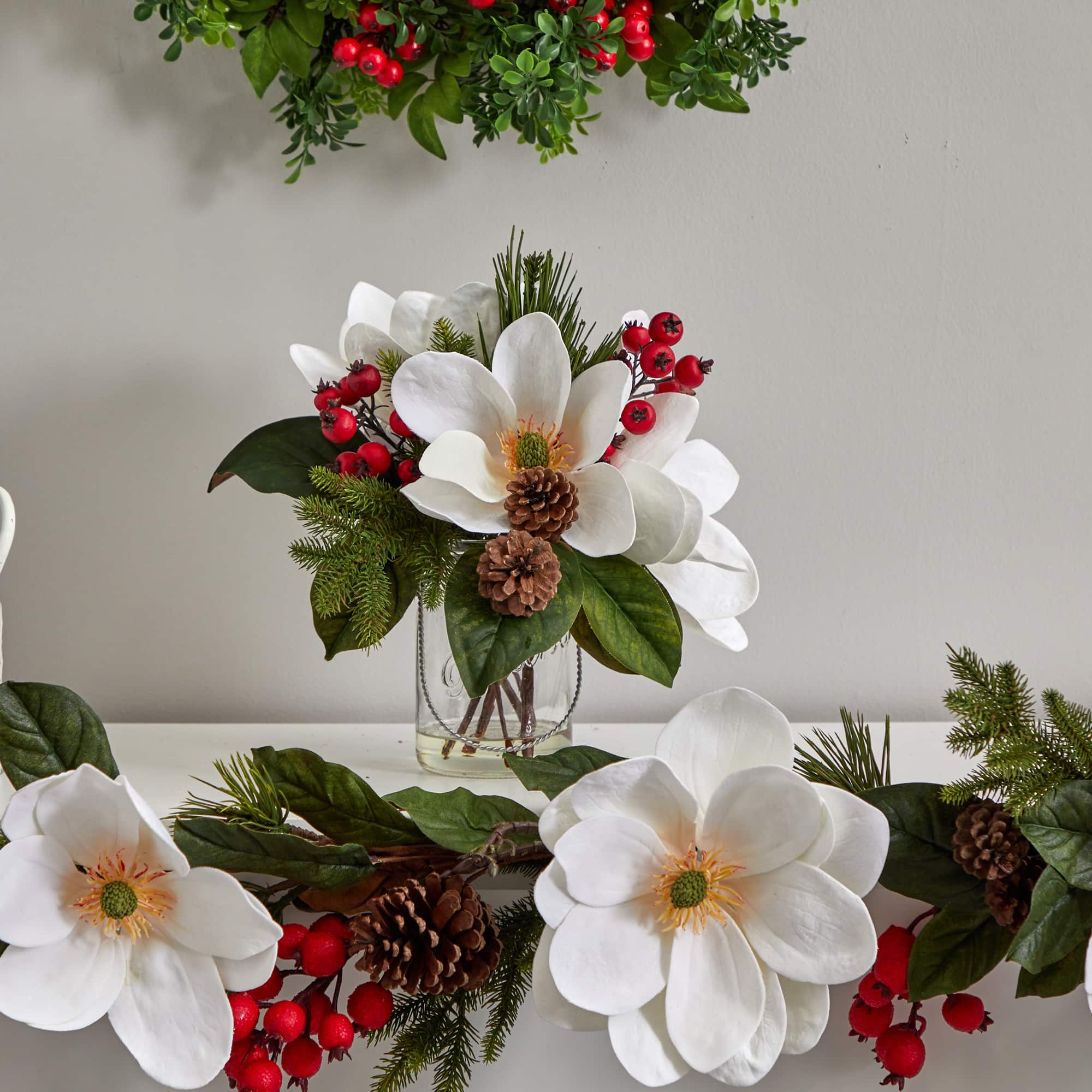 12" Magnolia, Pine & Berry Arrangement in Glass Vase