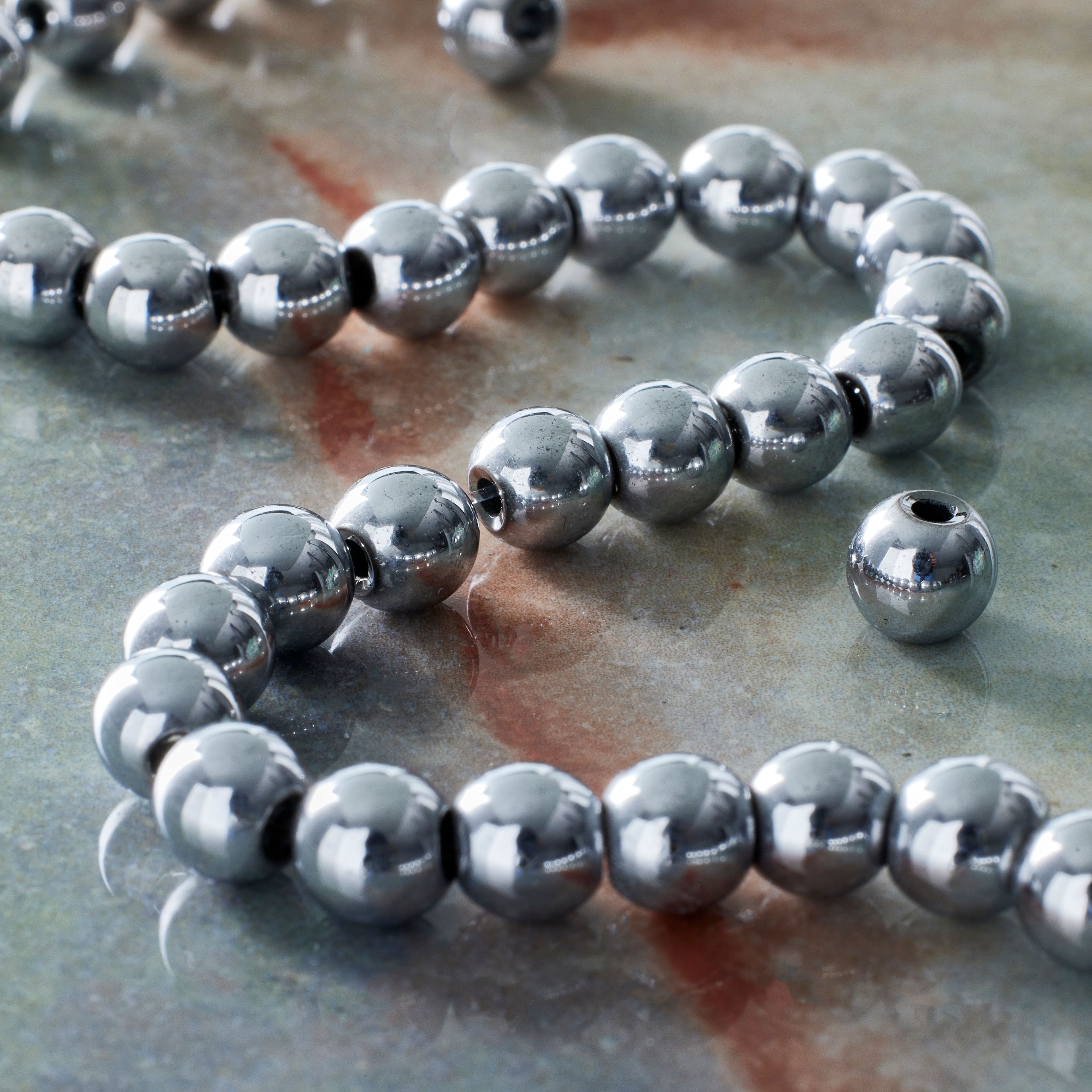 12 Pack: Rhodium Reconstituted Hematite Round Beads by Bead Landing