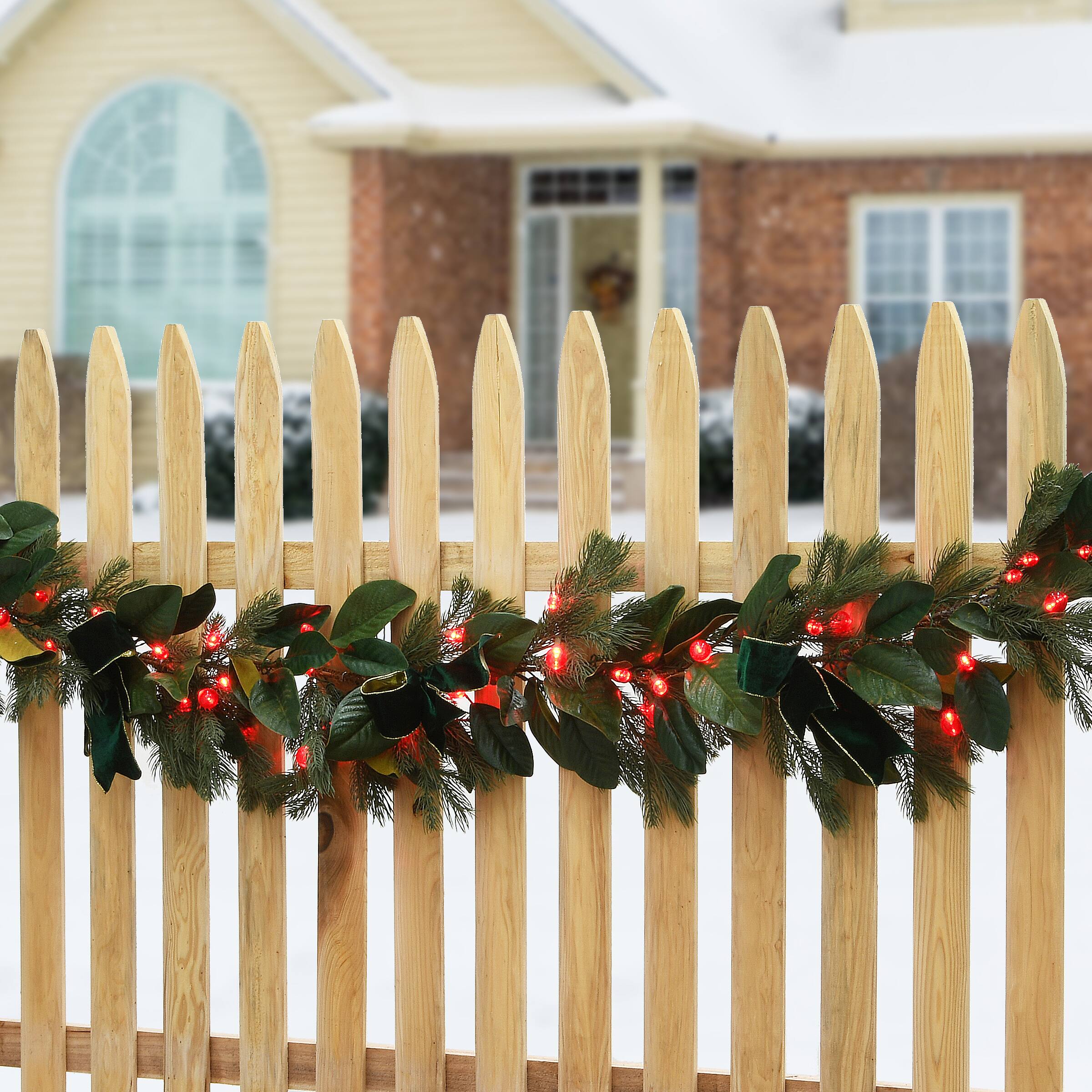 9ft. Magnolia Mix Pine Garland with LED Lights & Bows