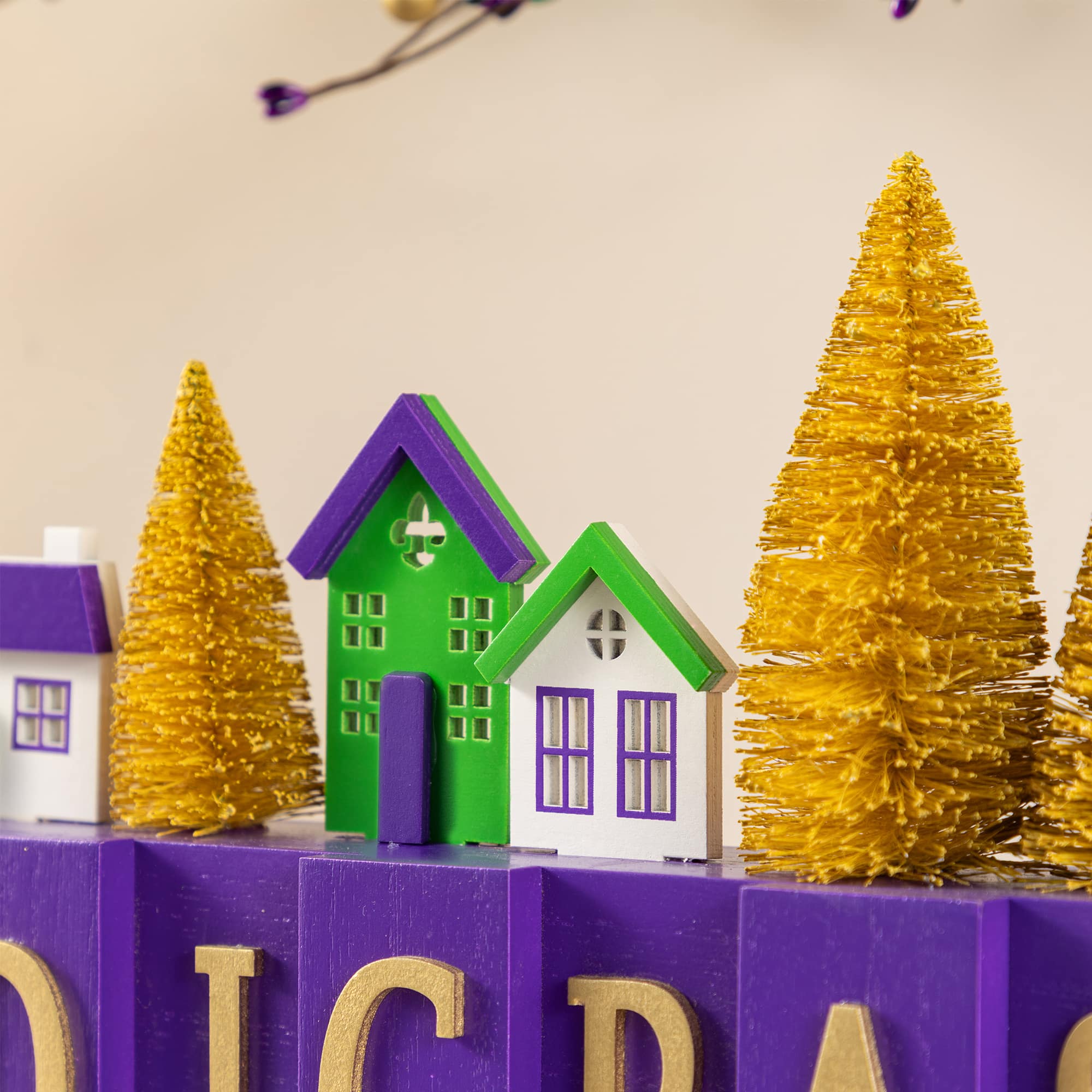 Glitzhome® 14" Mardi Gras Wooden House and Brush Trees Table Decor