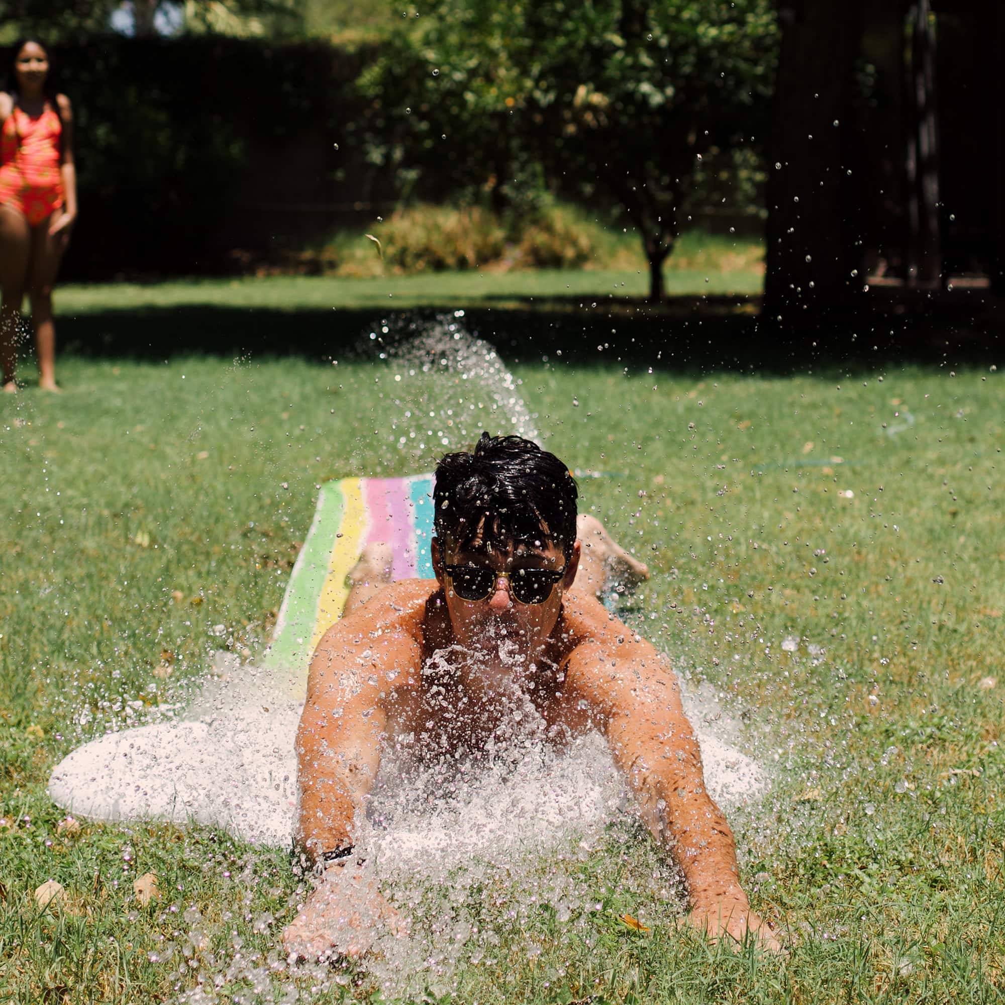Rae Dunn 16ft. Splish Splash Rainbow Slide & Ride with Sprinkler